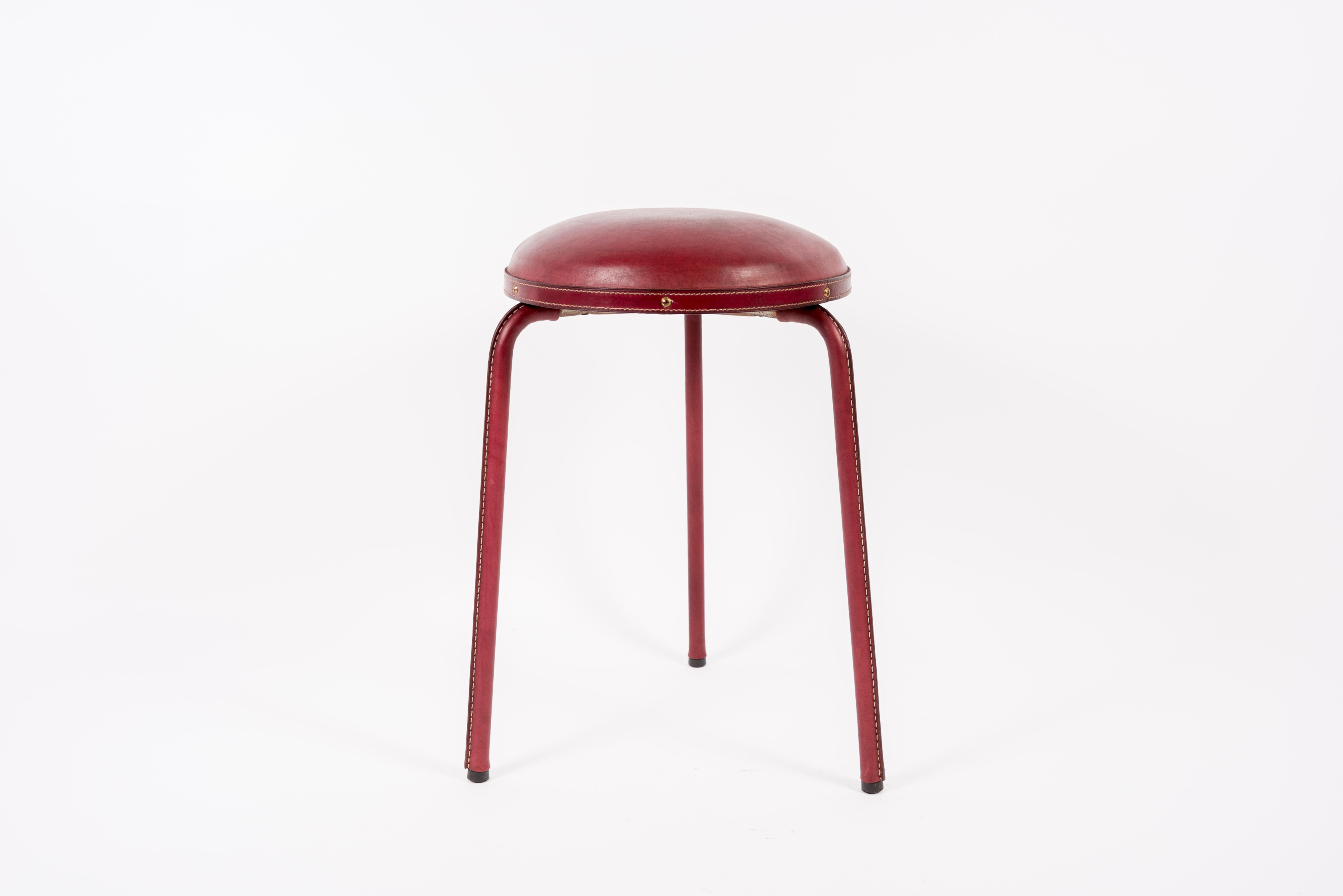 1950's stitched leather stools by Jacques Adnet
France.