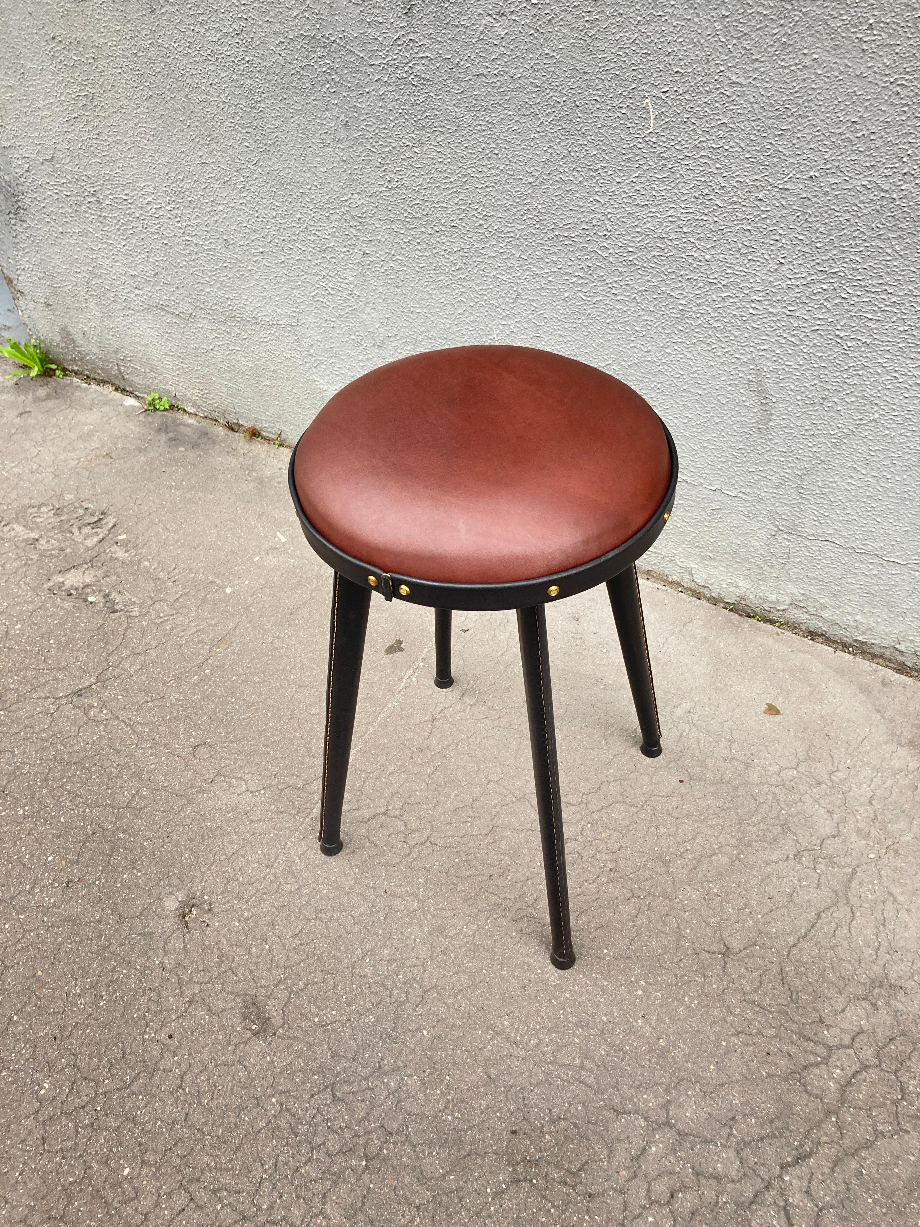Leather 1950's Stitched leather stools by Jacques Adnet For Sale