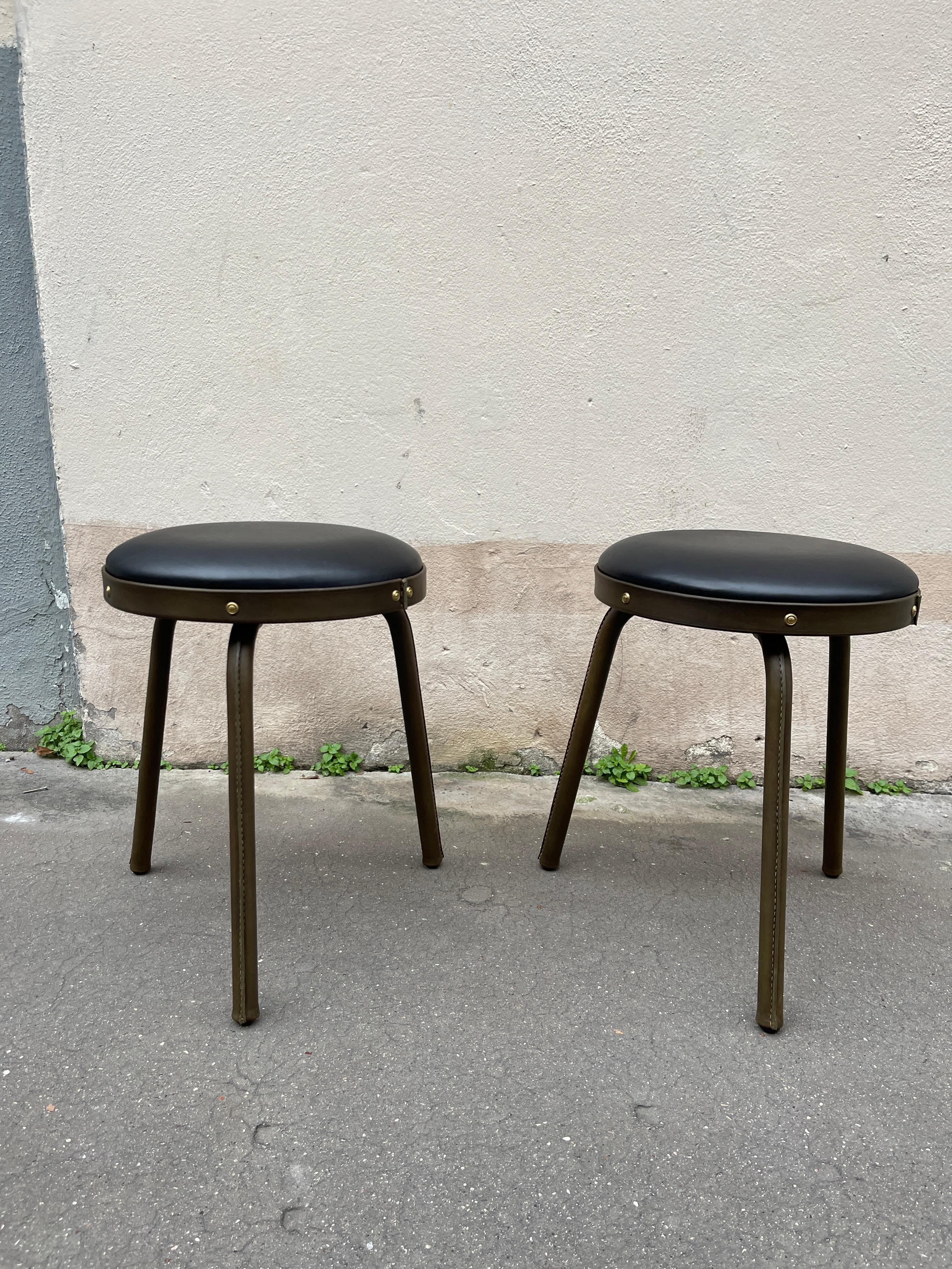 1950's Stitched leather stools by Jacques Adnet
France
Rare in this color
Black and olive green