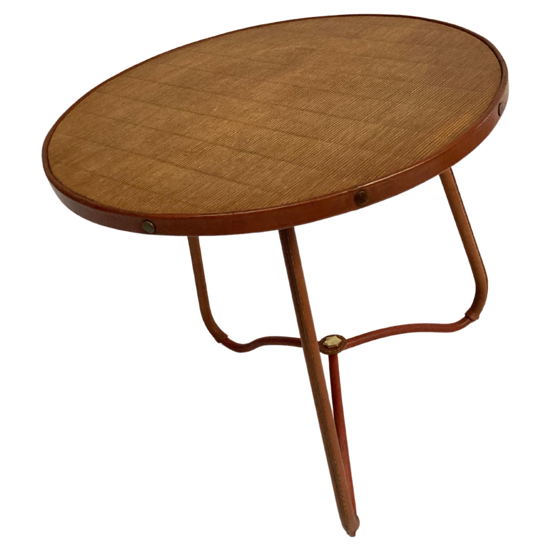 1950's Stitched leather table by Jacques Adnet
France.
