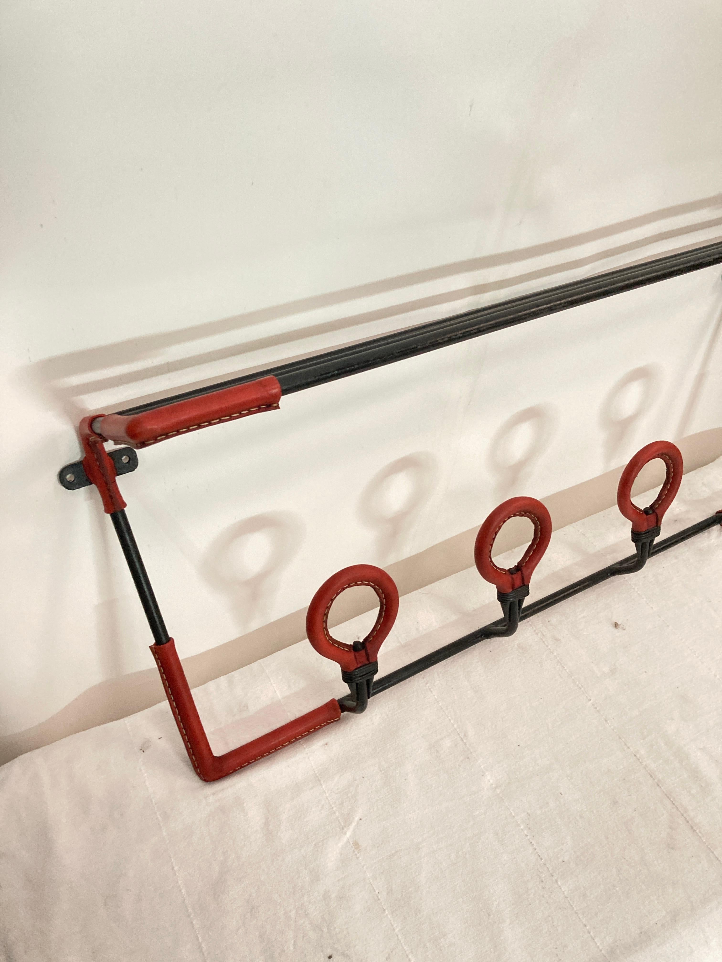 1950's Stitched leather wall coat rack by Jacques Adnet In Good Condition For Sale In Bois-Colombes, FR