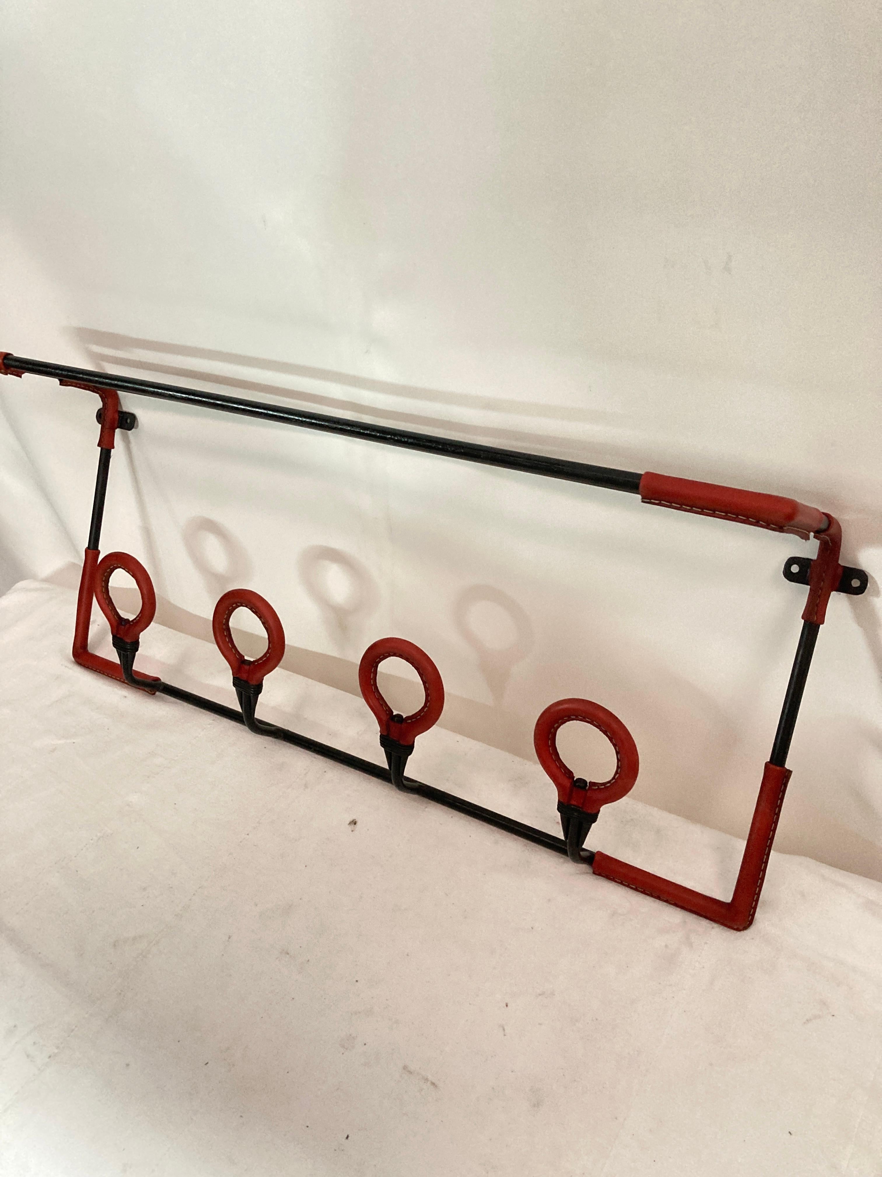 Mid-20th Century 1950's Stitched leather wall coat rack by Jacques Adnet For Sale