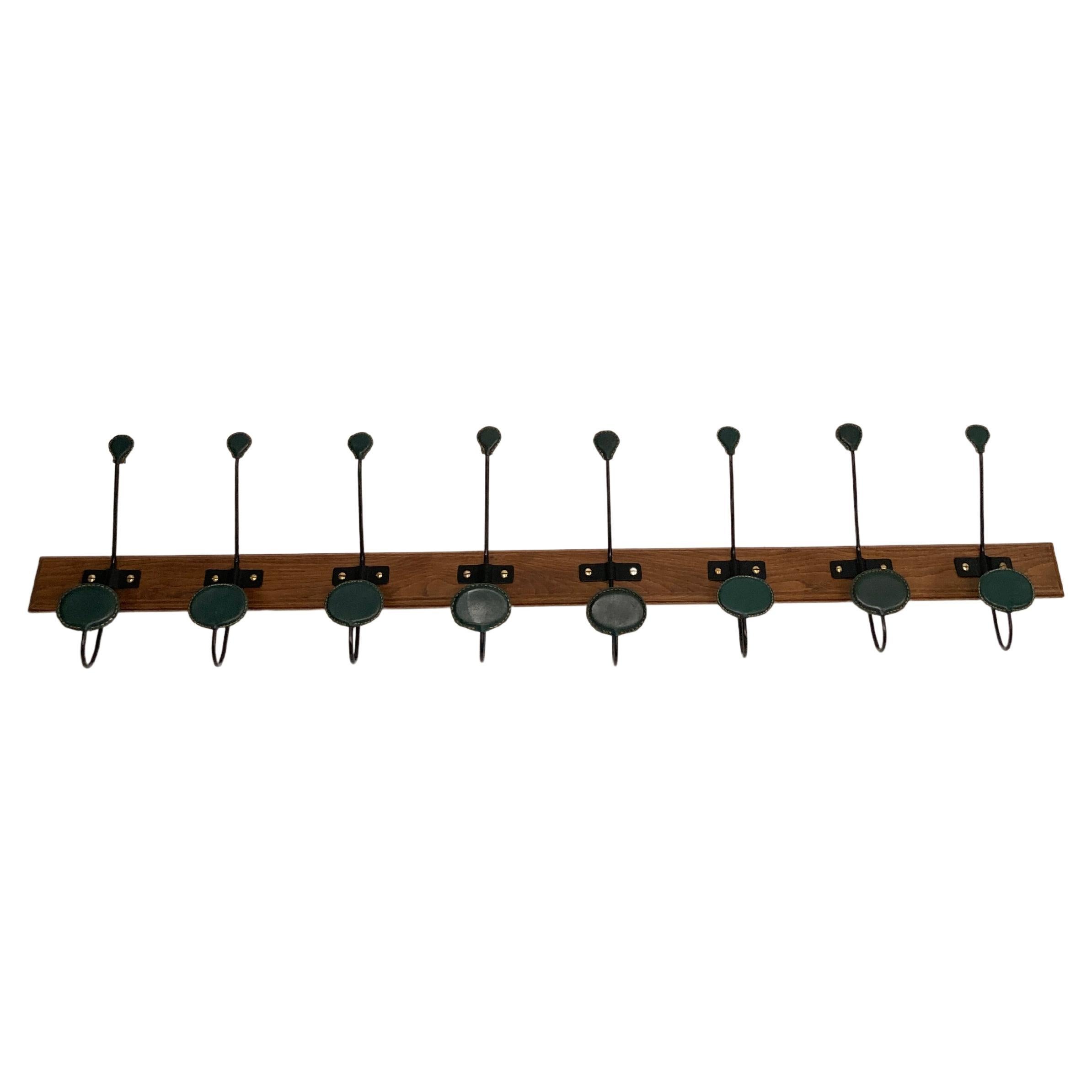 1950's Stitched leather wall coat rack by Jacques Adnet