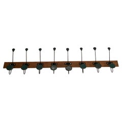 1950's Stitched leather wall coat rack by Jacques Adnet