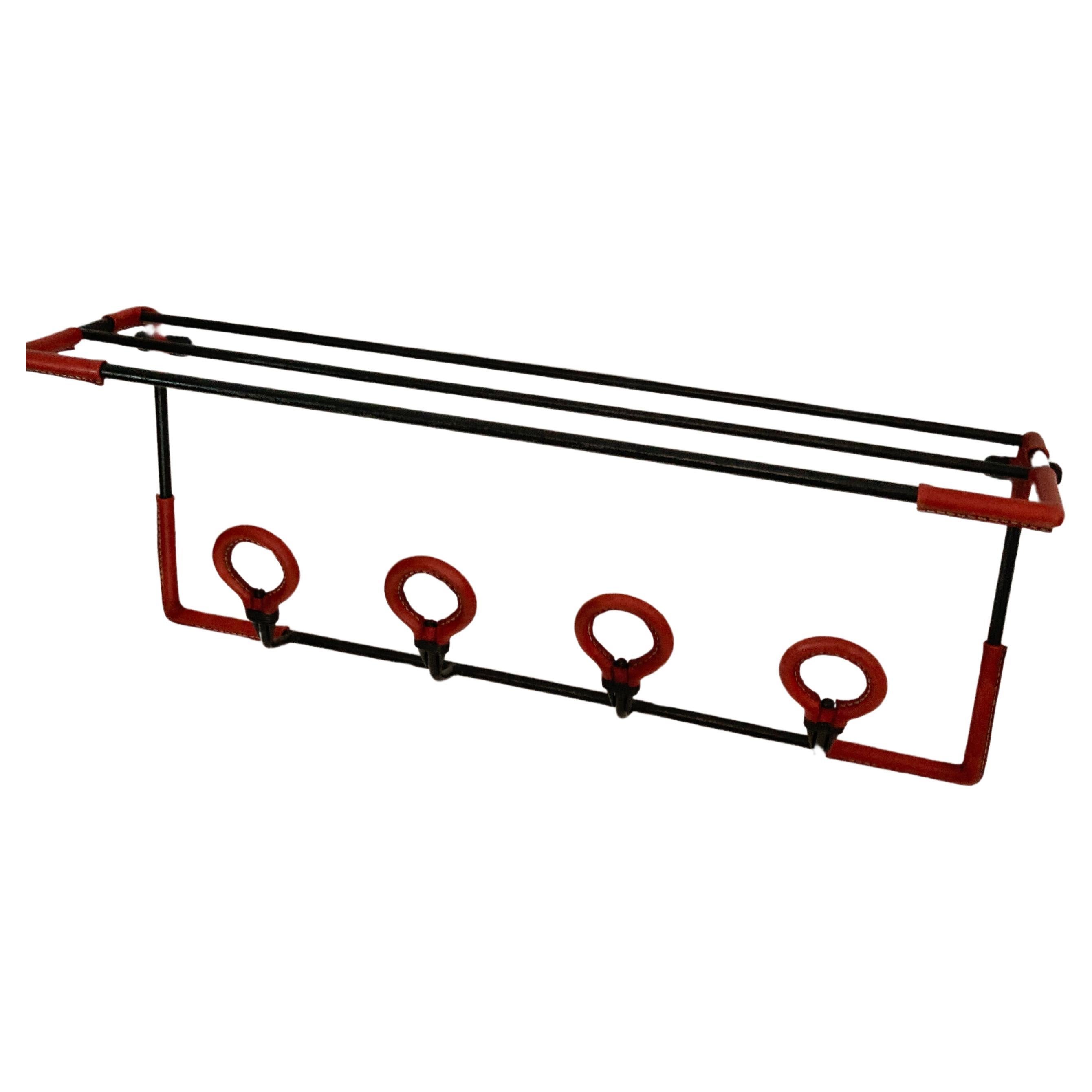 1950's Stitched leather wall coat rack by Jacques Adnet For Sale