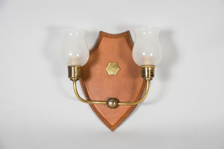 1950's Stitched leather Sconces with two lights
Great condition.