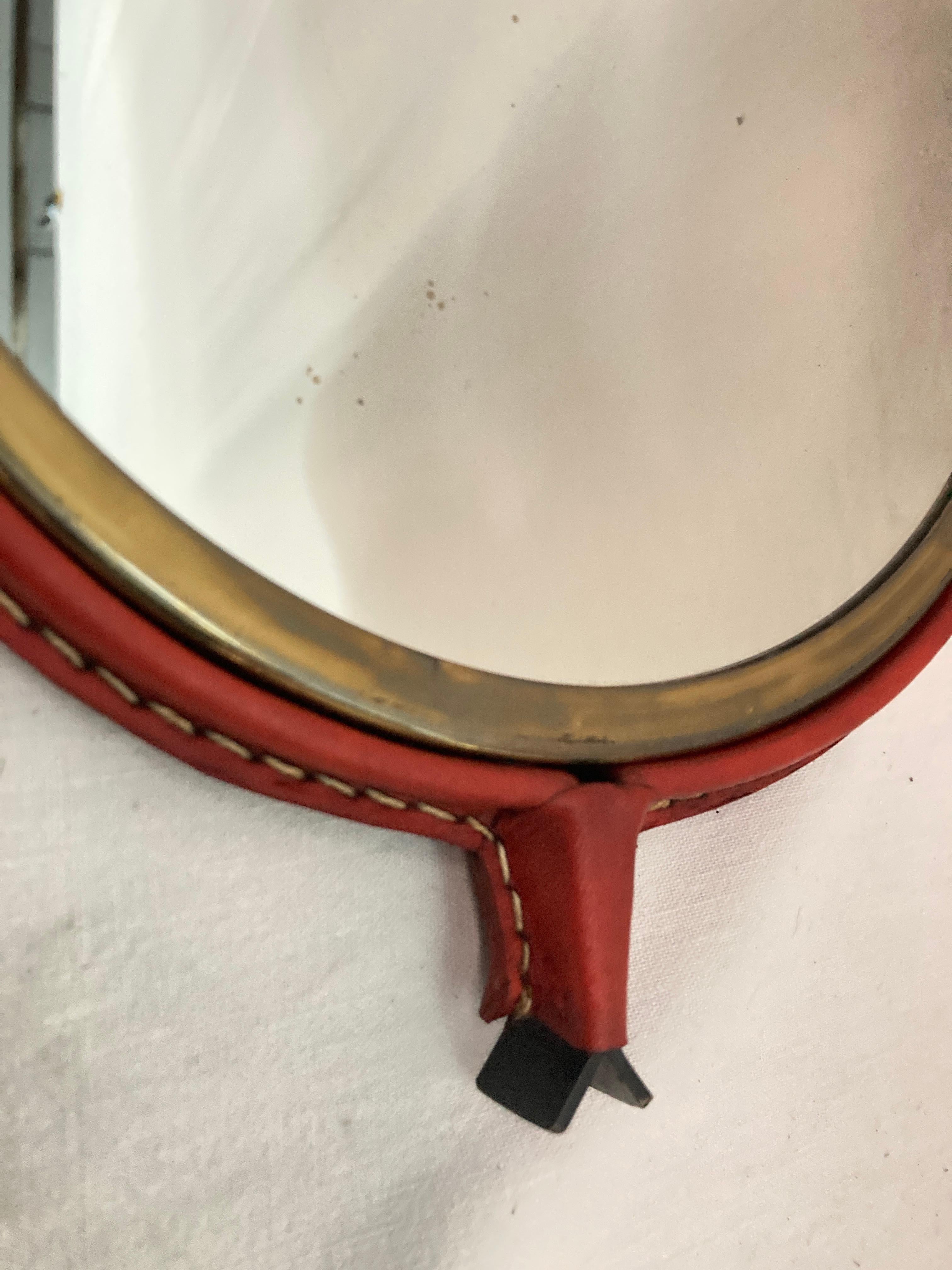 1950's Stitched leather wall Mirror by Jacques Adnet In Good Condition For Sale In New York, NY
