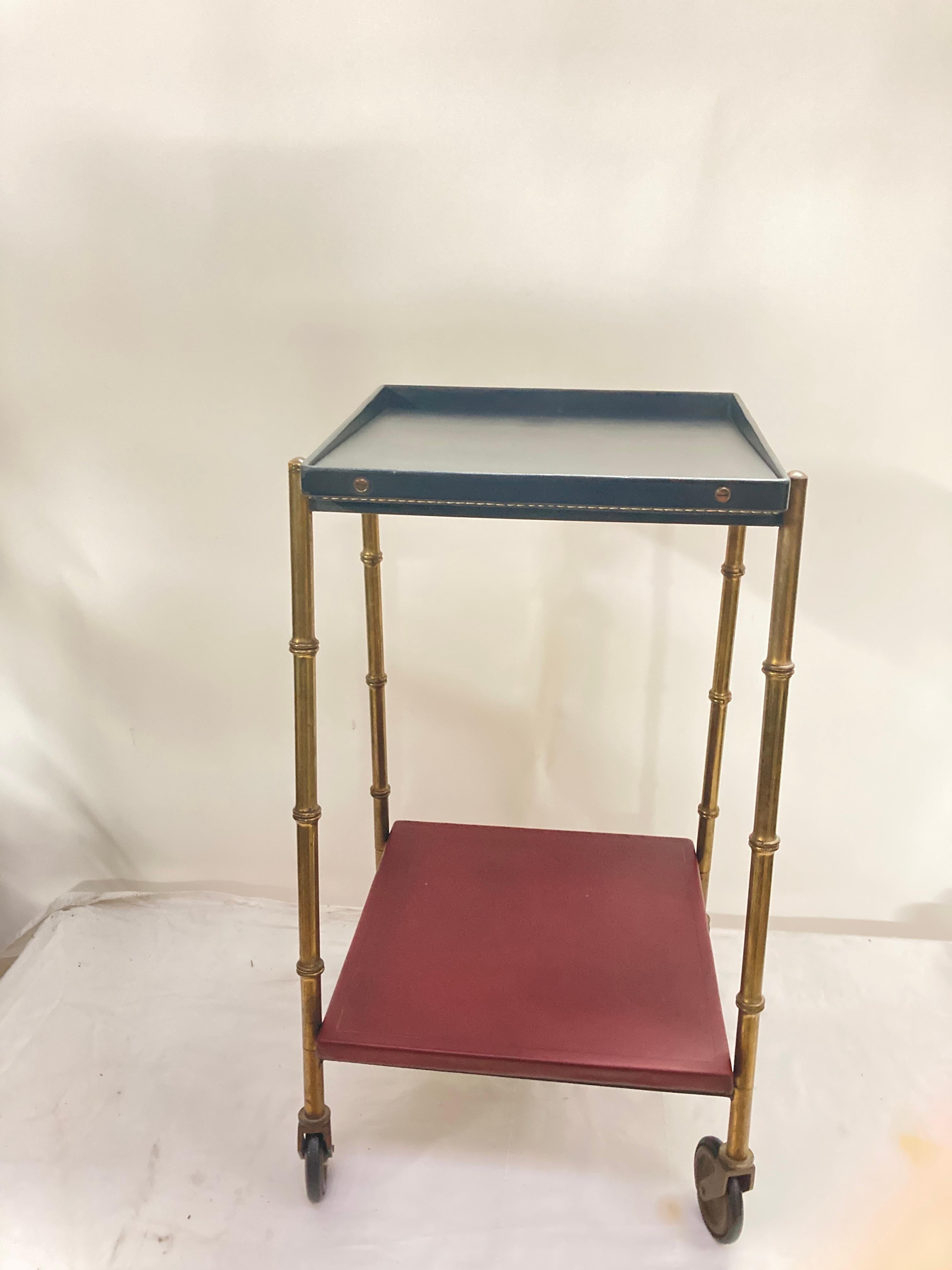 1950's Stitched leather and brass table by Jacques Adnet
France
