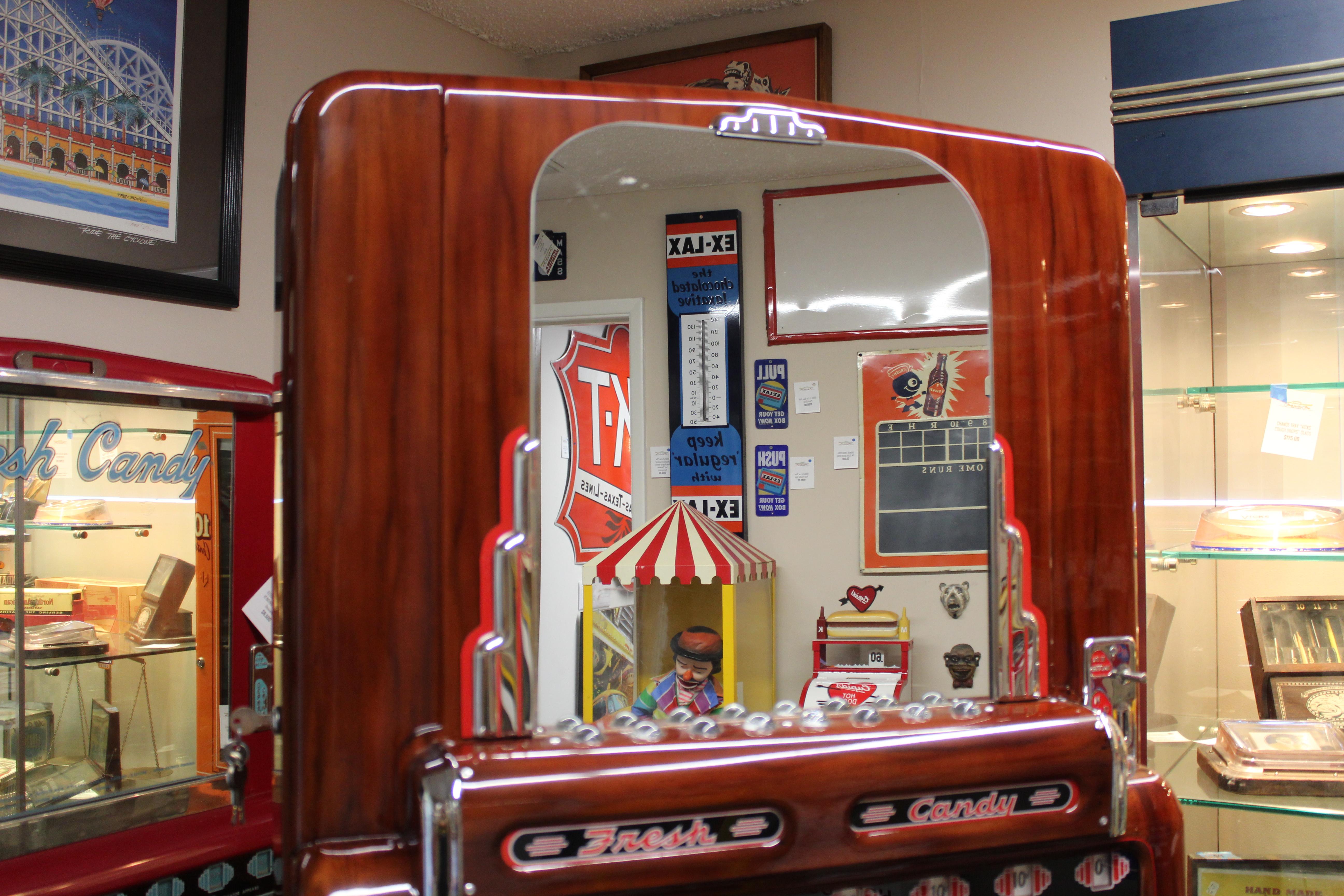 Amazing restoration condition. Completely restored and in working condition. Main attribute of this beautiful machine versus a regular candy machine is it lights up the darkest room, like a movie theater! Best way to find the candy in a 1950s movie