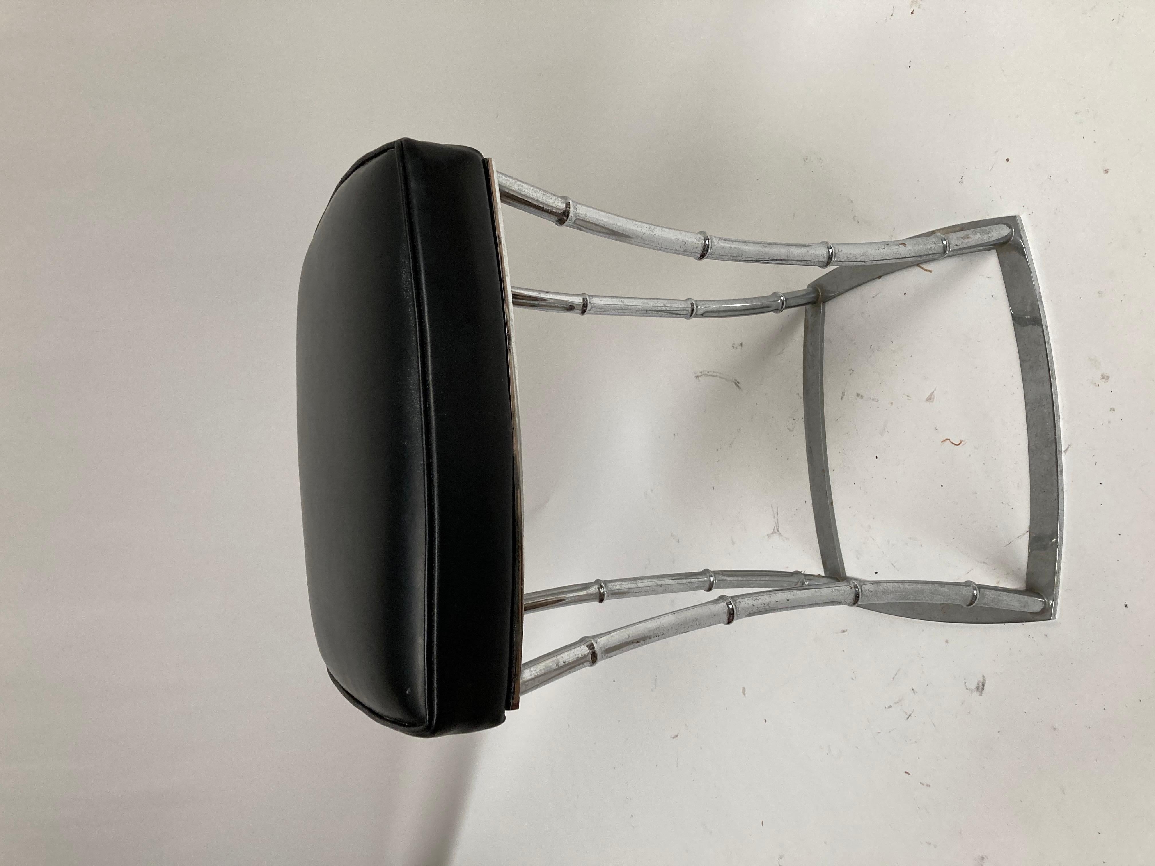1950's stool attributed to Jacques Adnet
Black leather and chromed metal
France.