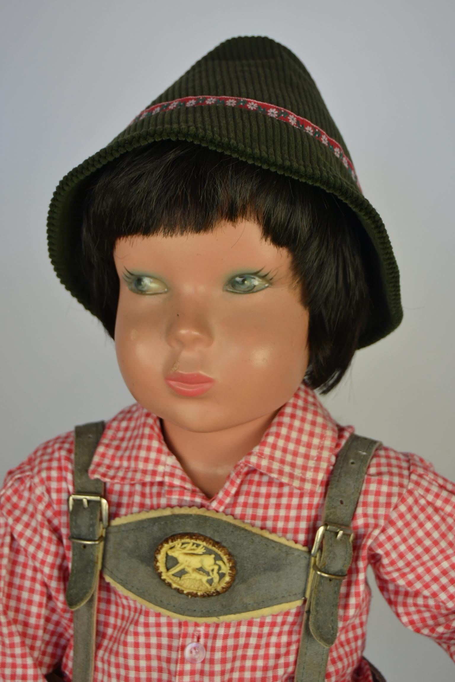 Cute little 1950s mannequin child, shop display child, store window doll.
Made in the style of Kathe Kruse, a well known German Doll Company.
The boy has low hanging cheeks and fine painted eyes, what gives him a cute, naughty expression. He has