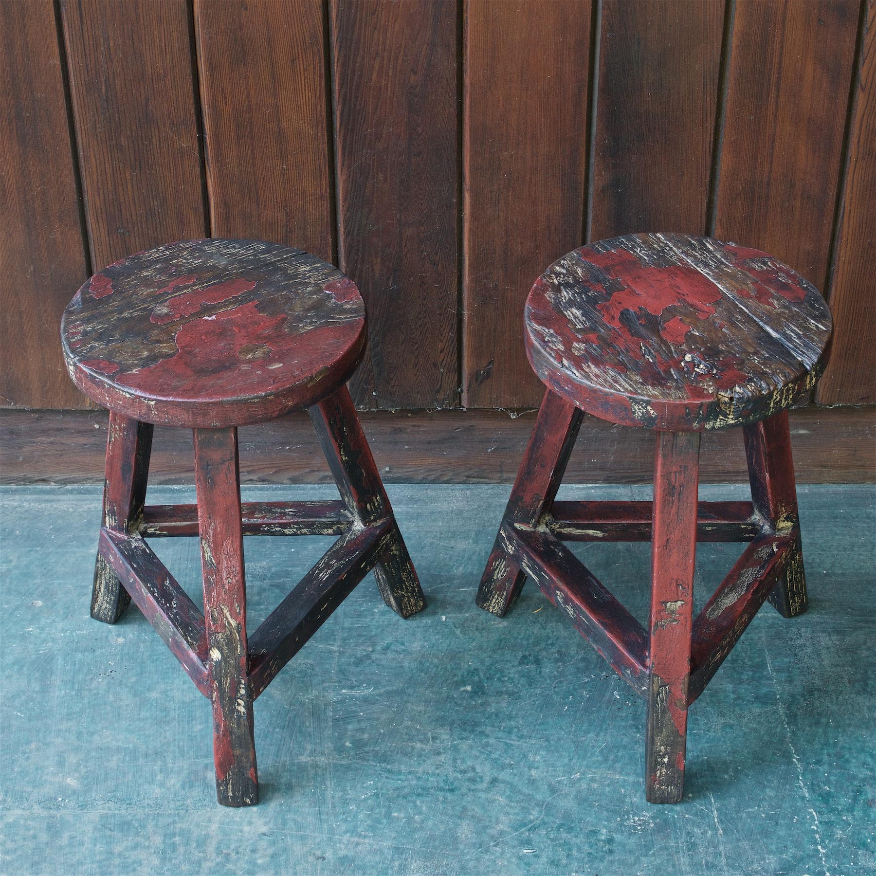 Sold by the piece. Vintage 1950s Three-Legged Hand-Crafted Stools, Two are available. The loose paint has been wire brushed off, and stools have been waxed.