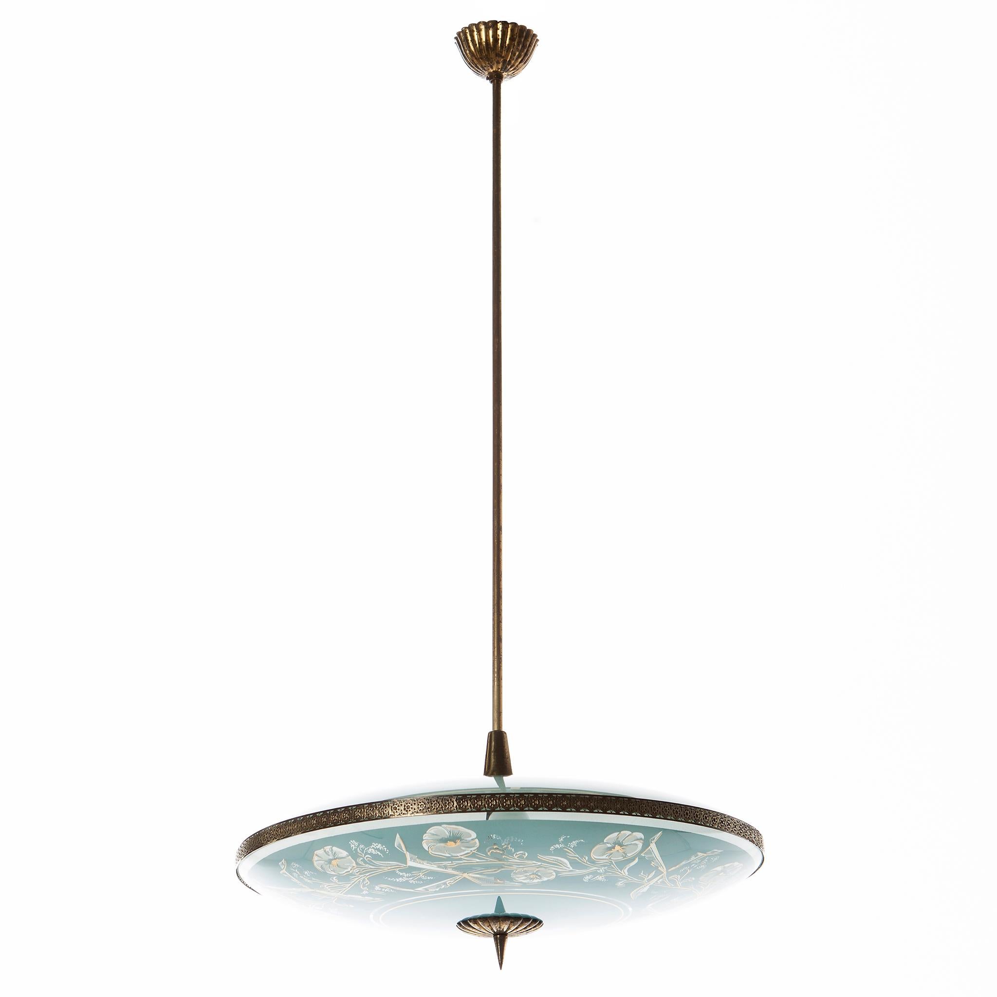 This elegant piece consisting of a brass frame and 2 unique frosted and satin glass reflector/dishes 
The lower round curved glass reflector with floral motifs and a gold-colored rim mounts below a round satin blue glass reflector. Finished off