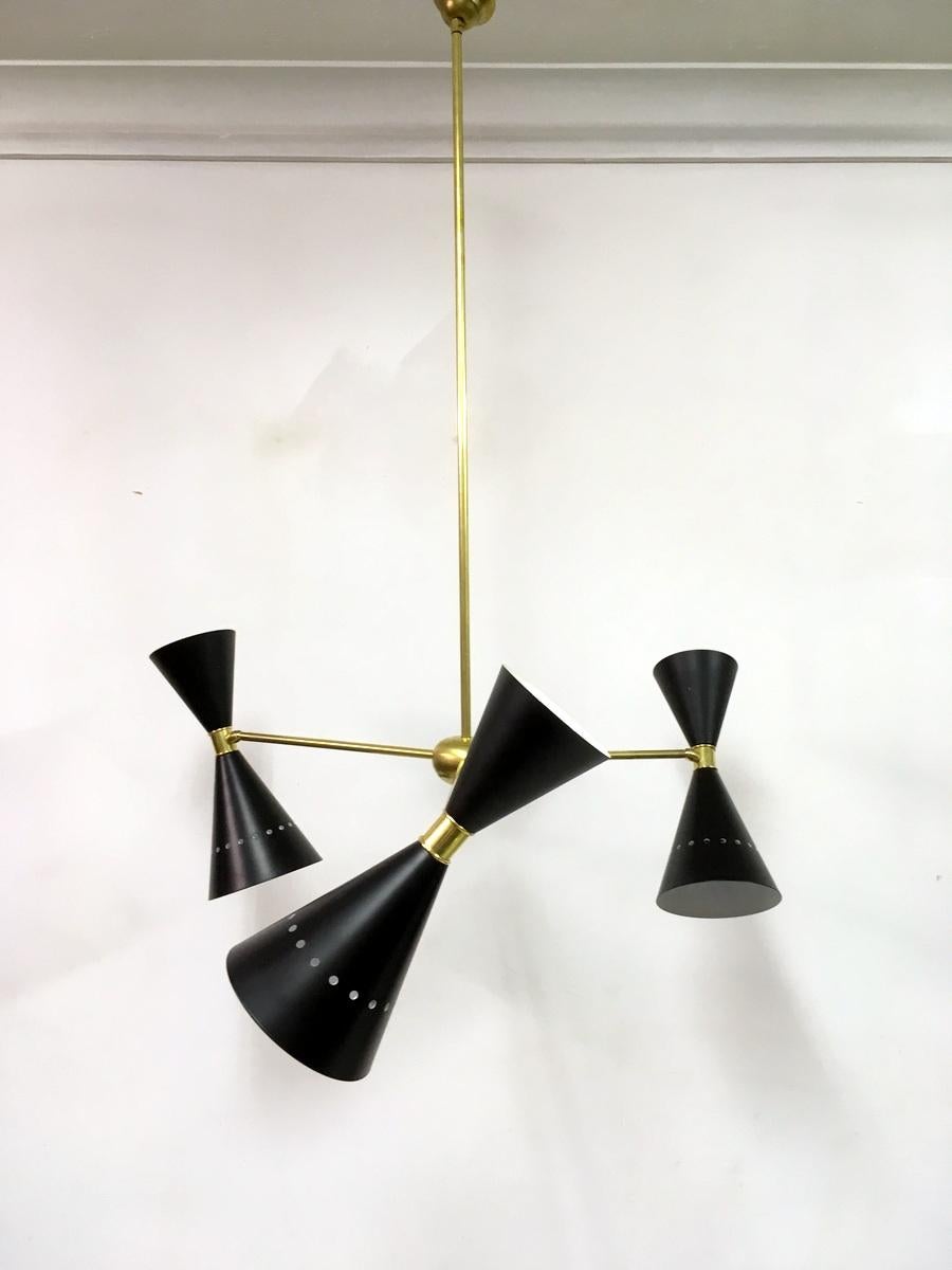 1950s style ceiling pendant
Brass frame
enameled shades.
Two lamps in each shade.
Made in Italy.
Two weeks lead time if not in stock
Other colors available.