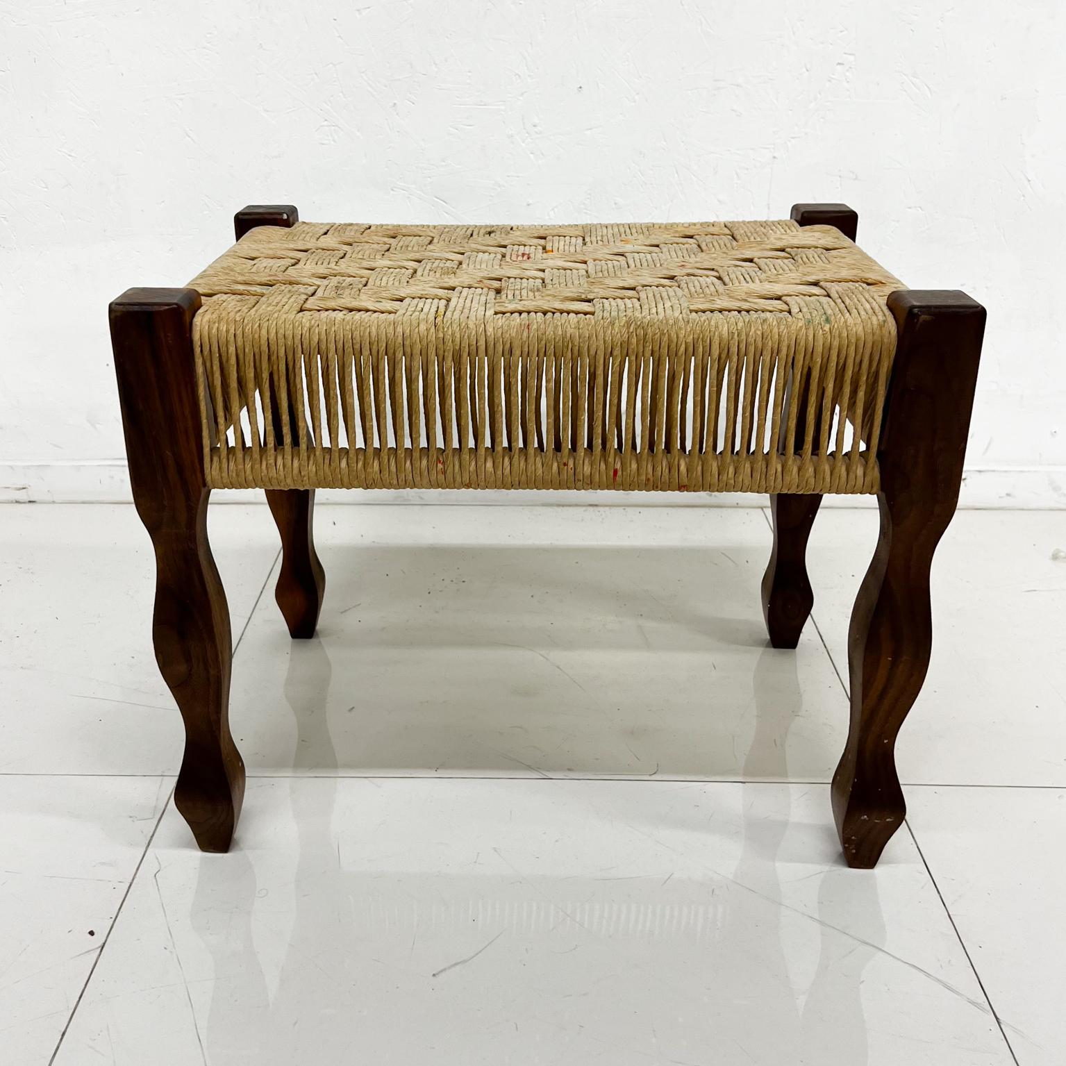 Bench with mahogany wood and paper rope.
Original unrestored finish. Vintage preowned condition.
From an artist's studio, it has signs of vintage paint spots.
Unmarked.
Firm and sturdy.
Measures: 15 deep x 27.5 wide x 17.25 tall
See all images