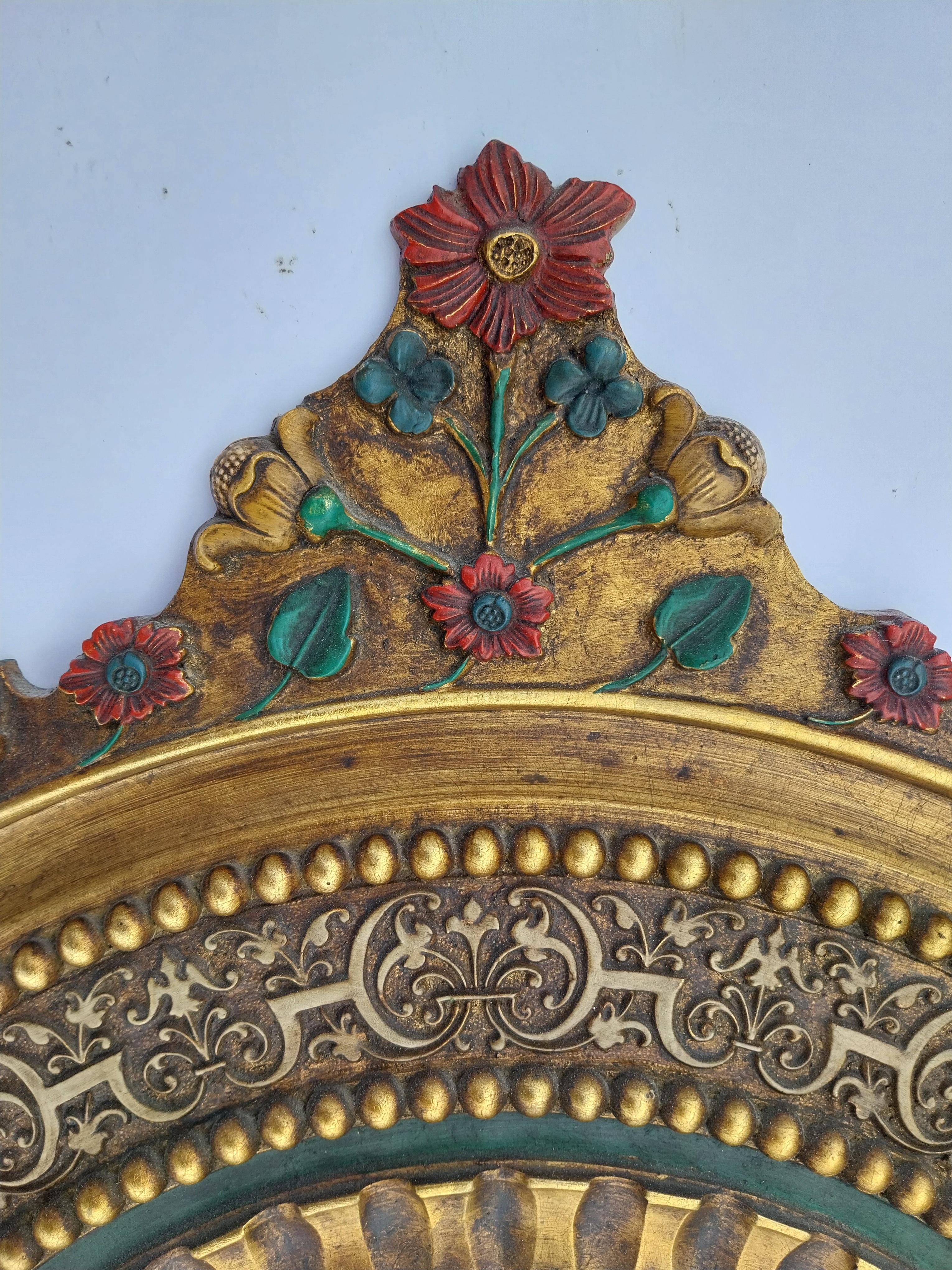 Molded 1950's sunburst painted convex resin mirror For Sale