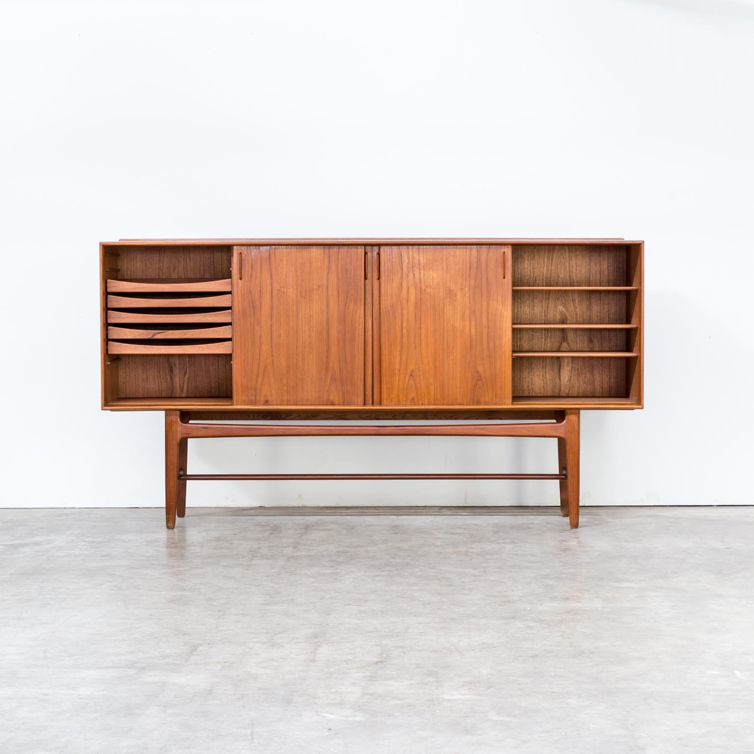 1950s Svend Aage Madsen sideboard for Knudsen & Son. Measure: Teak 225 cm sideboard in good condition consistent with age and use.
