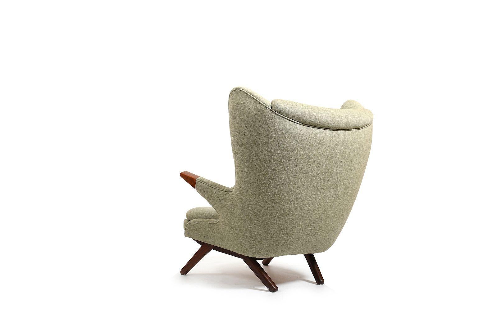 Old bear lounge chair (Bamsestol), model no.91 by Svend Skipper for Skippers Møbler Denmark 1950s. End of armrests and base in solid teak. Original upholstery with light green wool fabric. Early production.
