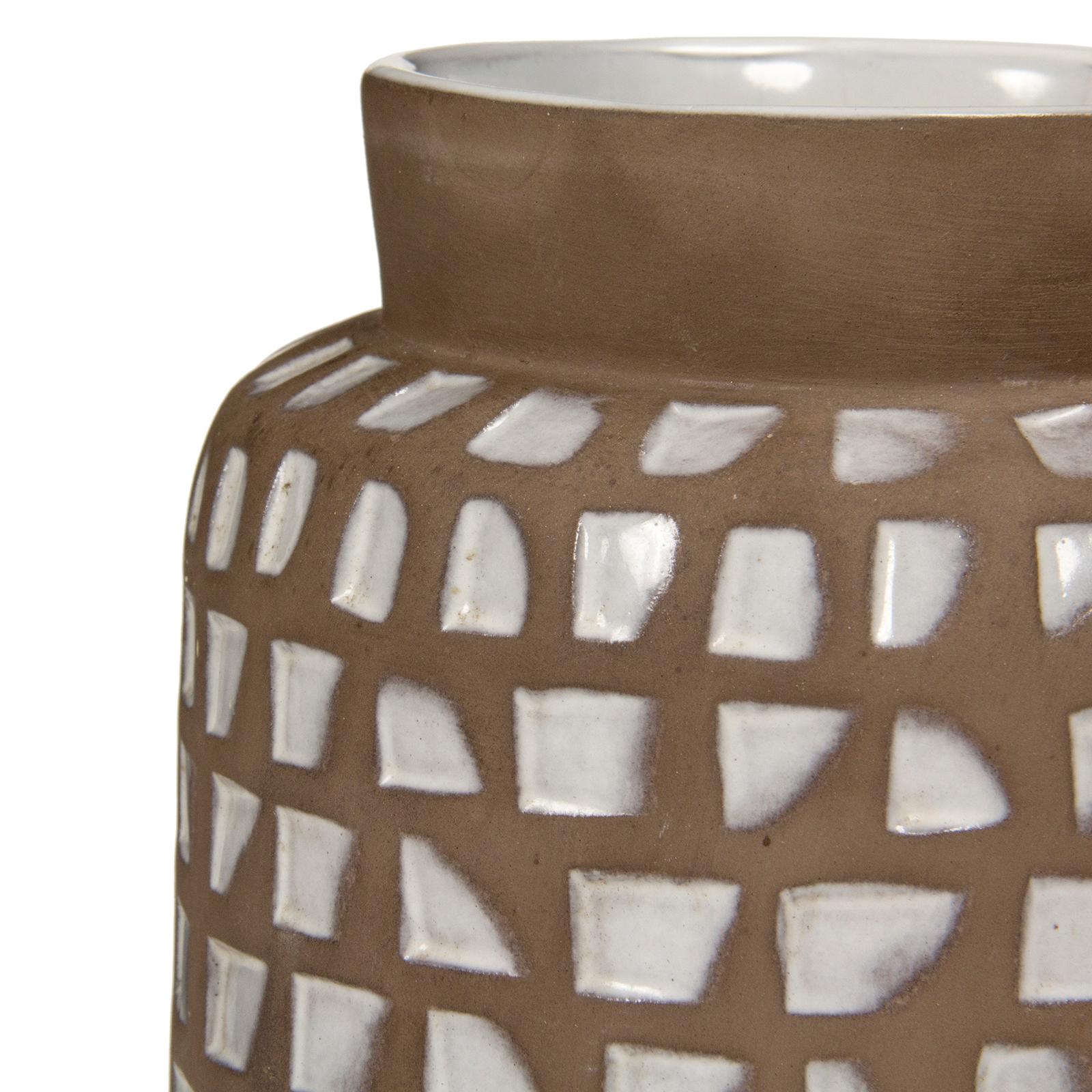 A tall brown ceramic vase by Ingrid Atterberg with incised glossy white decoration from the 'Africa' series.
 
