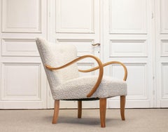 1950s Swedish Designer Lounge Chair Made Of Elm Wood With Faux Fur Upholstery