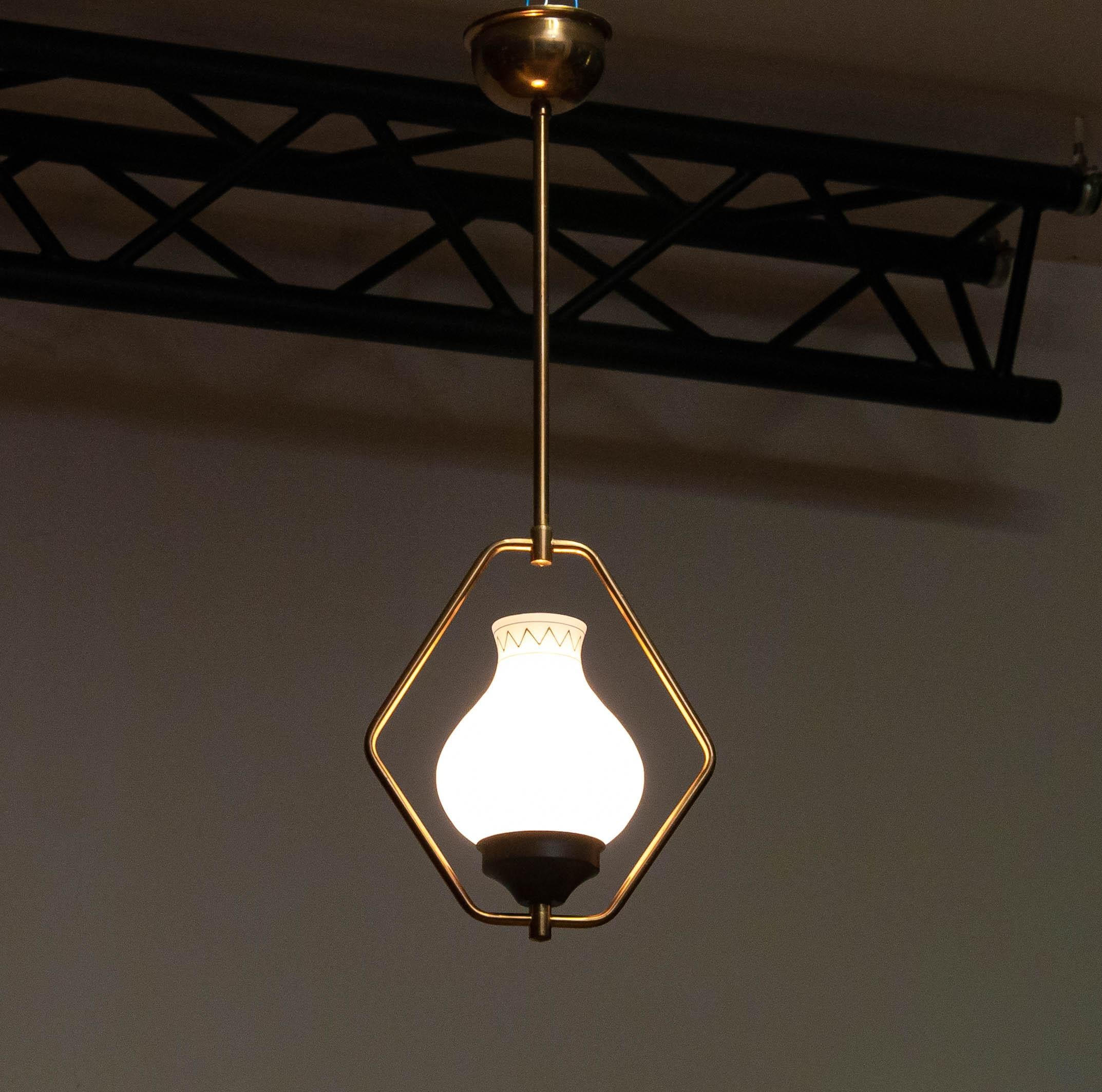 Mid-Century Modern 1950s Swedish Designer Pendant In Brass With Opal Art Glass. For Sale