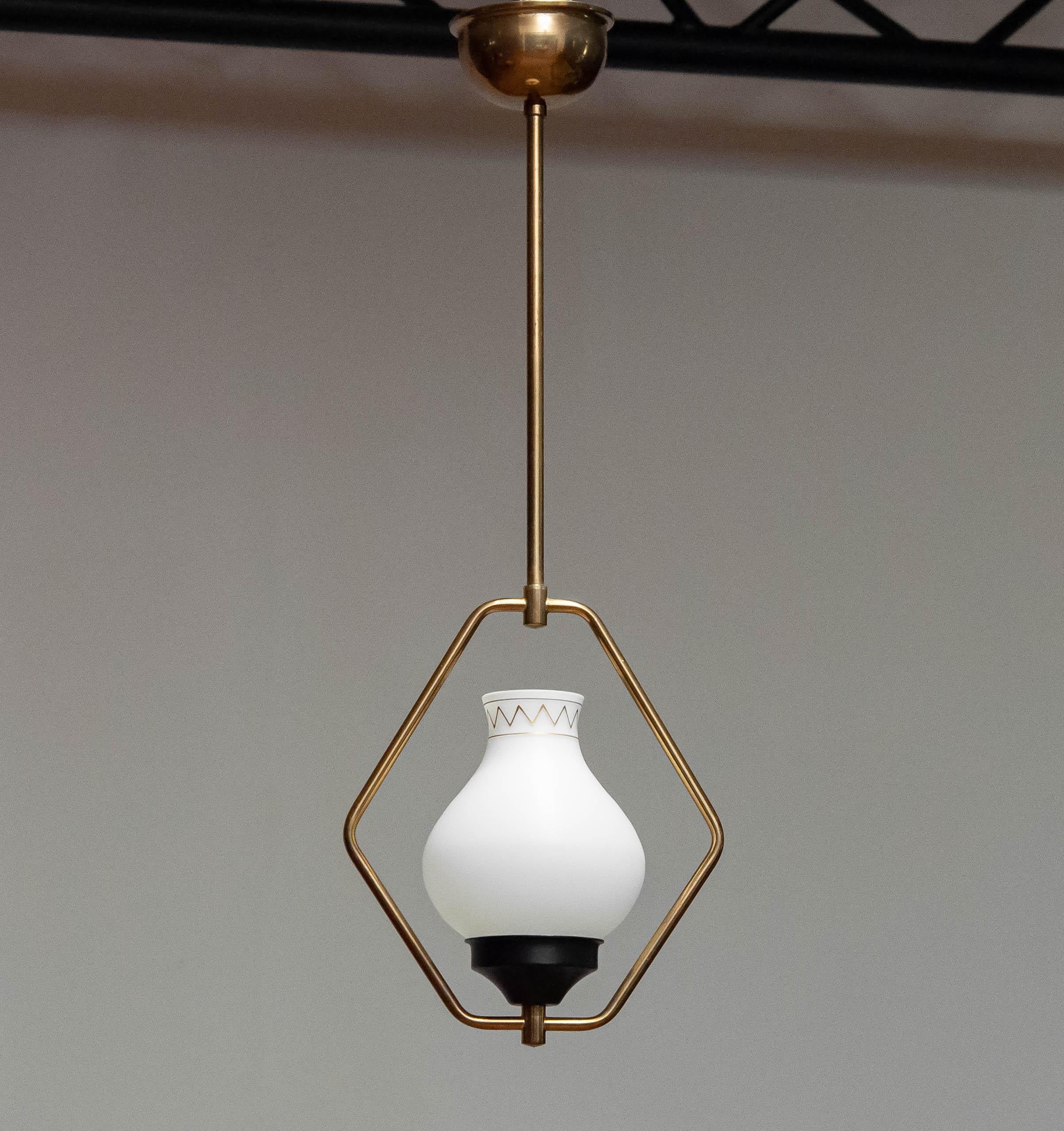 20th Century 1950s Swedish Designer Pendant In Brass With Opal Art Glass. For Sale