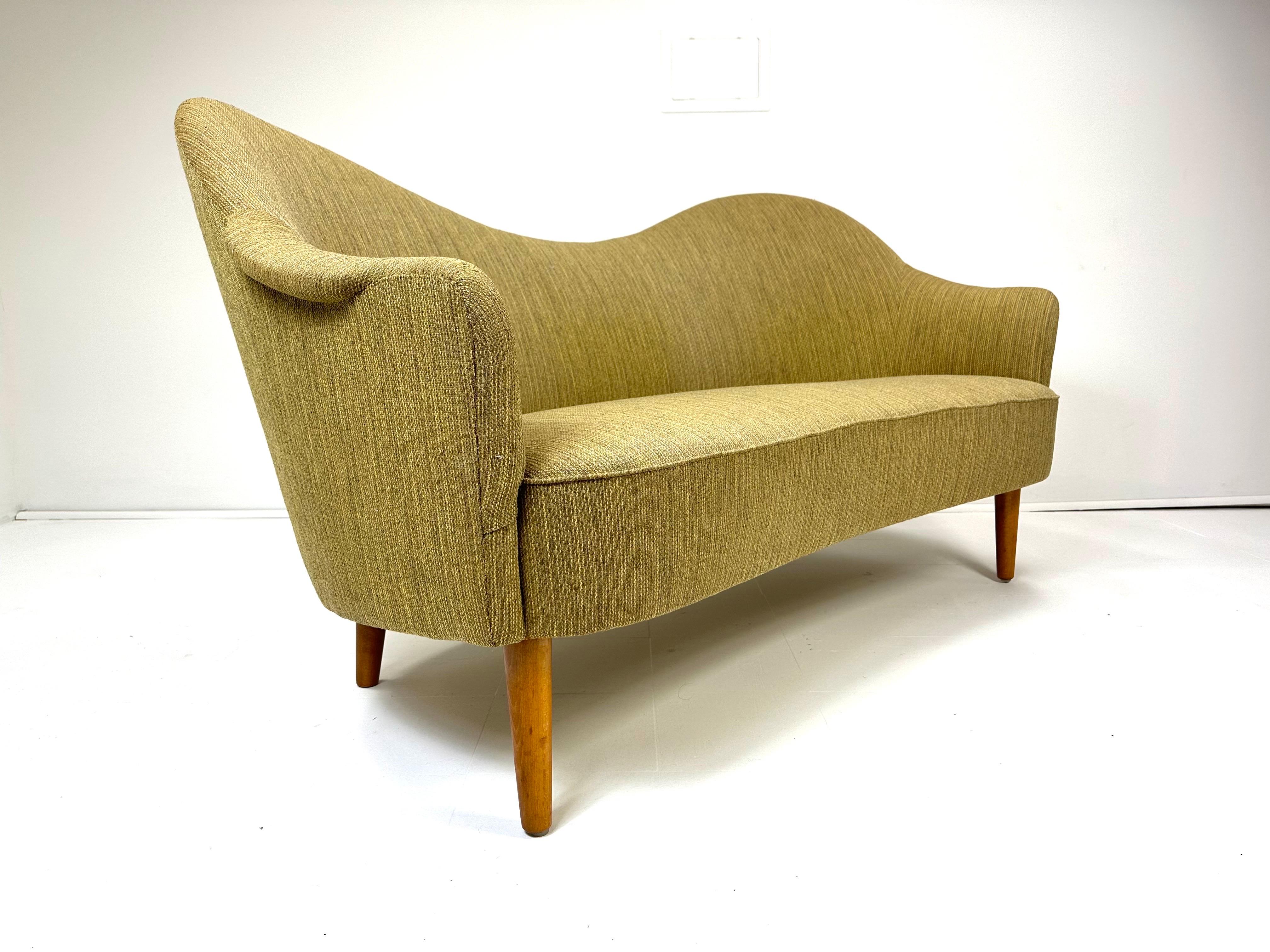 1950’s “Samspel” Sofa designed by renowned Swedish designer Carl Malmsten. Beautiful organic design. Beech legs. Vintage upholstery.
Produced by AB Record