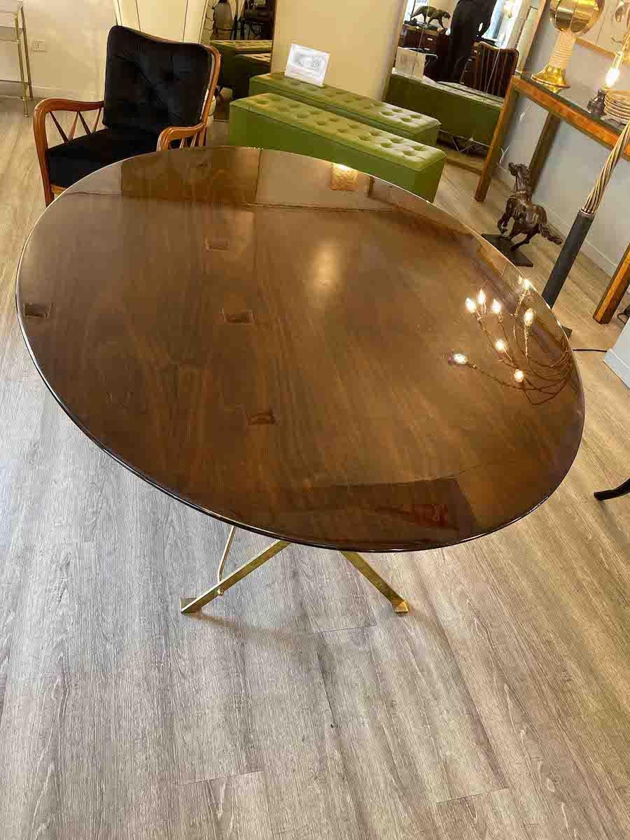 T3 table by Luigi Caccia Dominioni for Azucena in wood and brass from the 1950s. 

The wooden top is polyester-polished lacquered wood, the legs are brass. 

Dimensions : 180 x 130 x H 72 cm

Please note that The price Of the object include the cost
