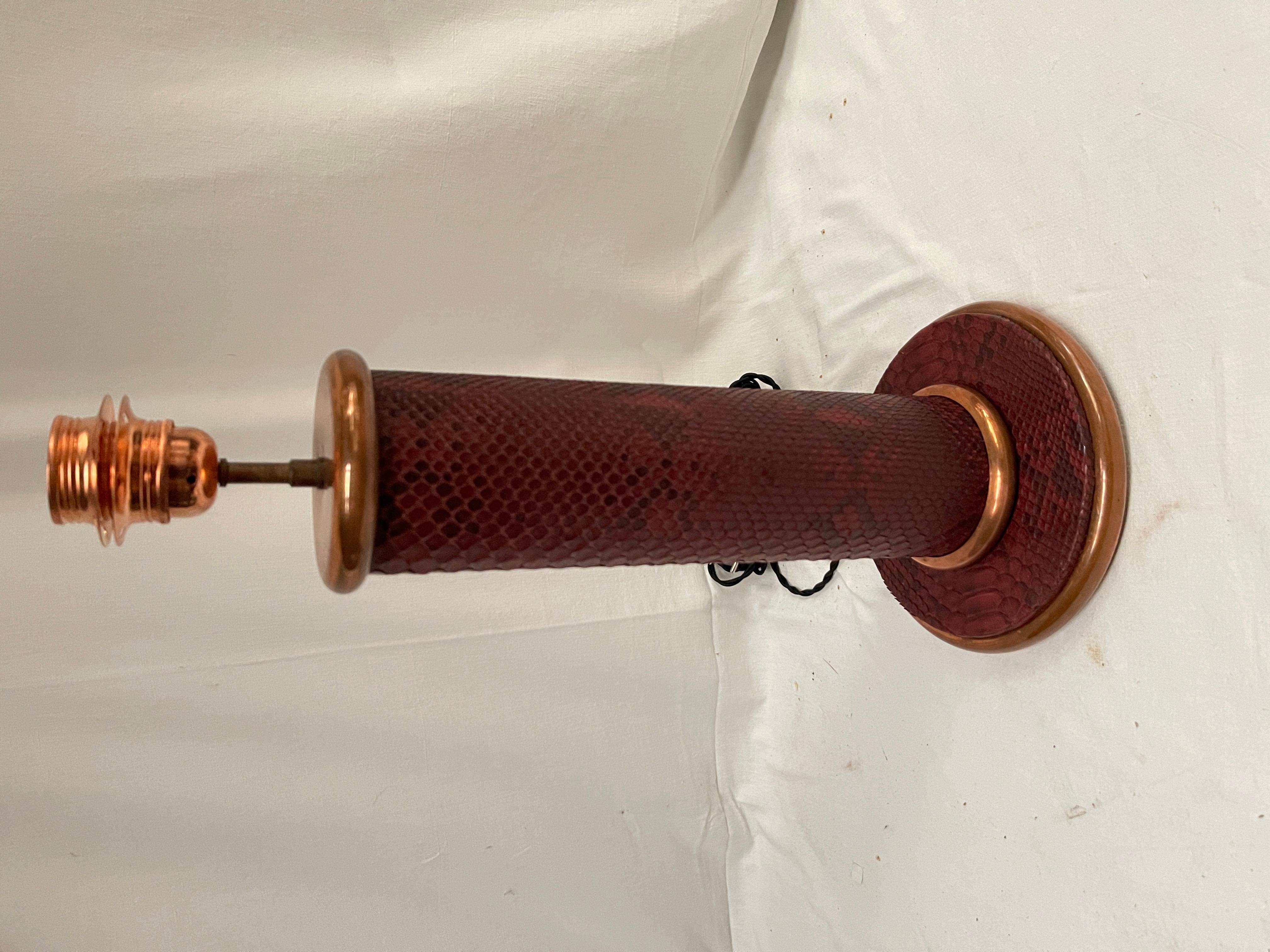 1950's table lamp covered with burgundy python skin and copper attributed to Paul Dupre-Lafon for Hermès
Re-wired
No shade included