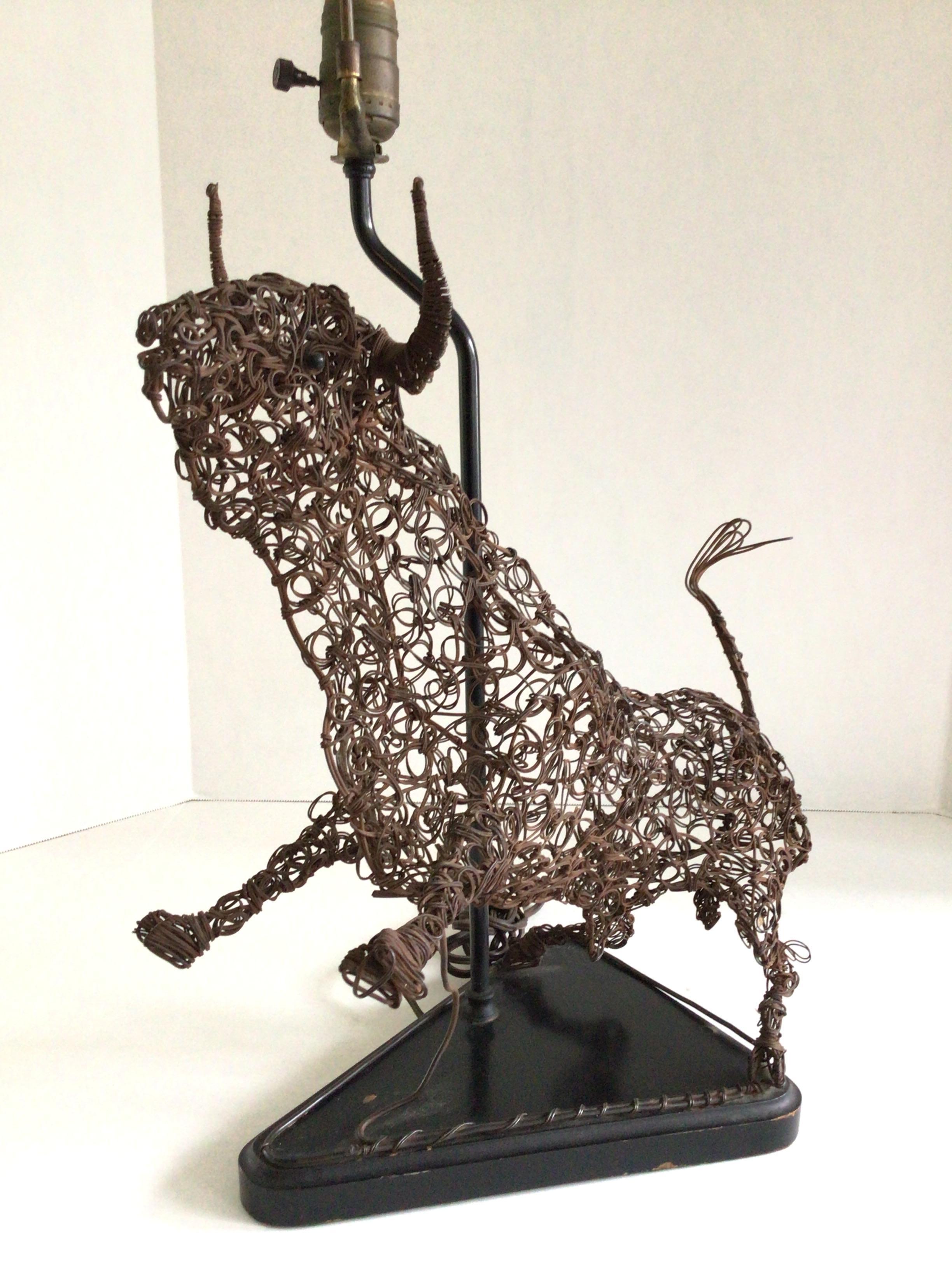 1950s Table Lamp of Abstract Twisted Wire Sculpture of a Bull on Wood Base
Height to top of finial: 27