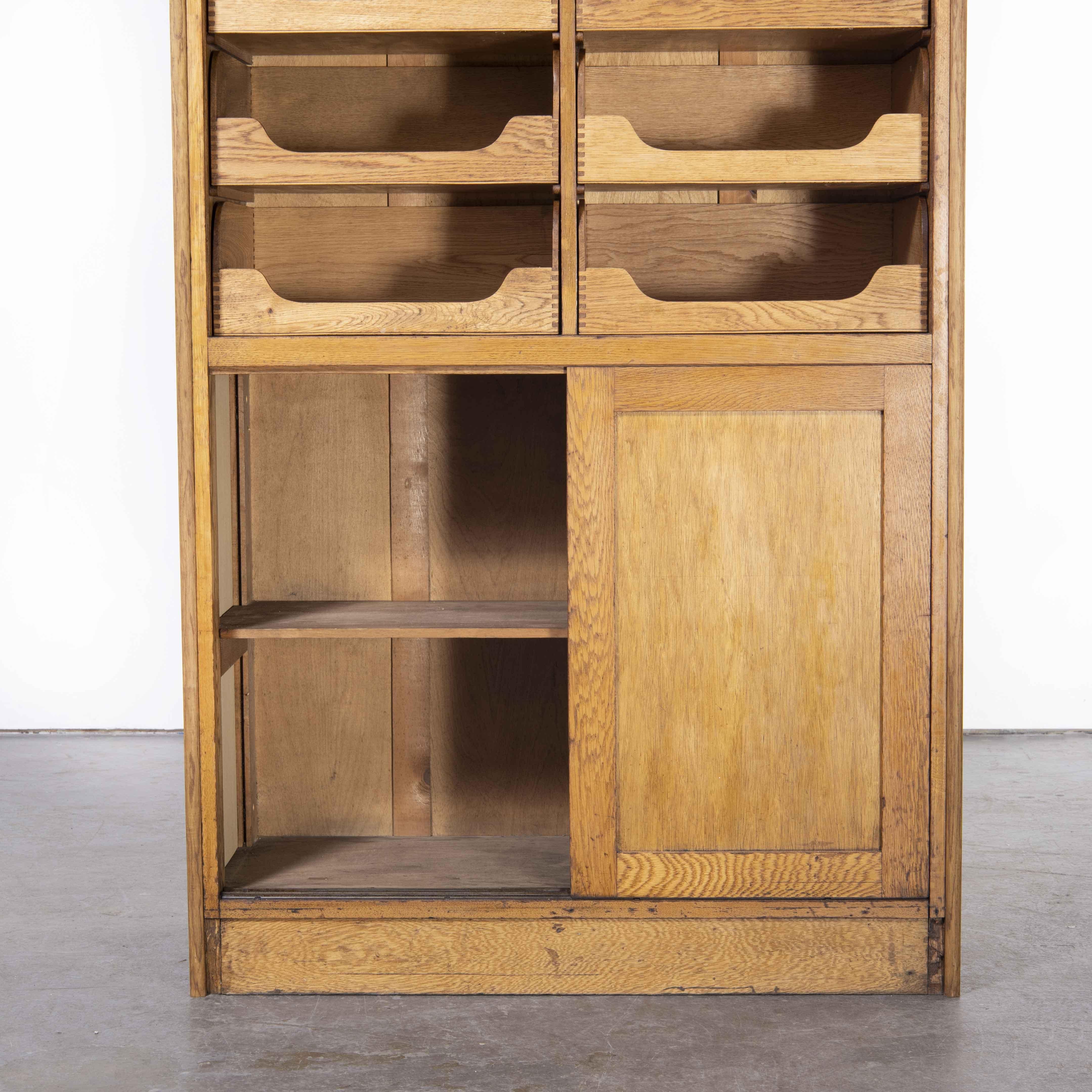 Mid-20th Century 1950's Tall English Haberdashery Shelved Cabinet, Sixteen Drawers Model 1244.2 For Sale