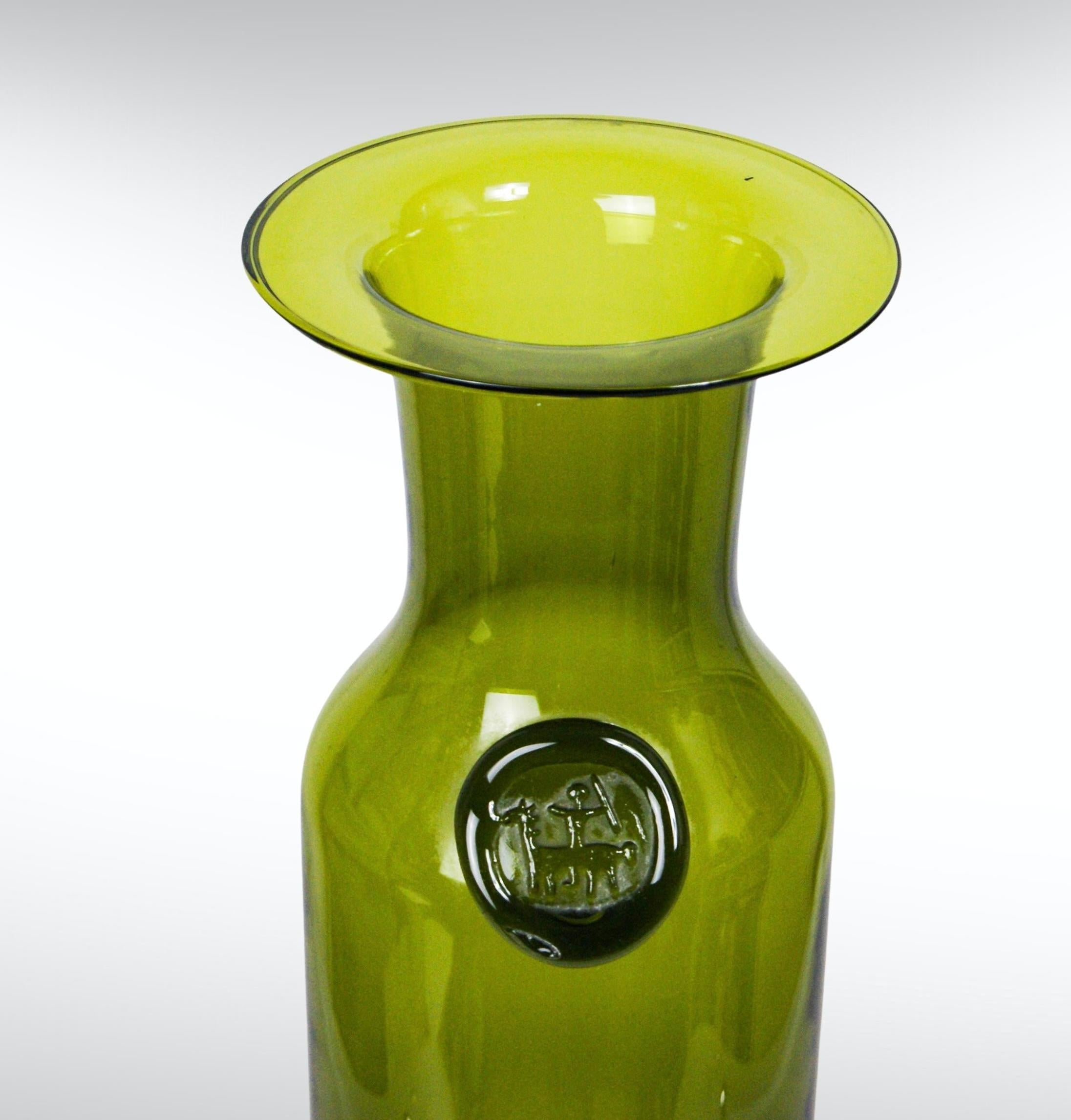 large green glass floor vase