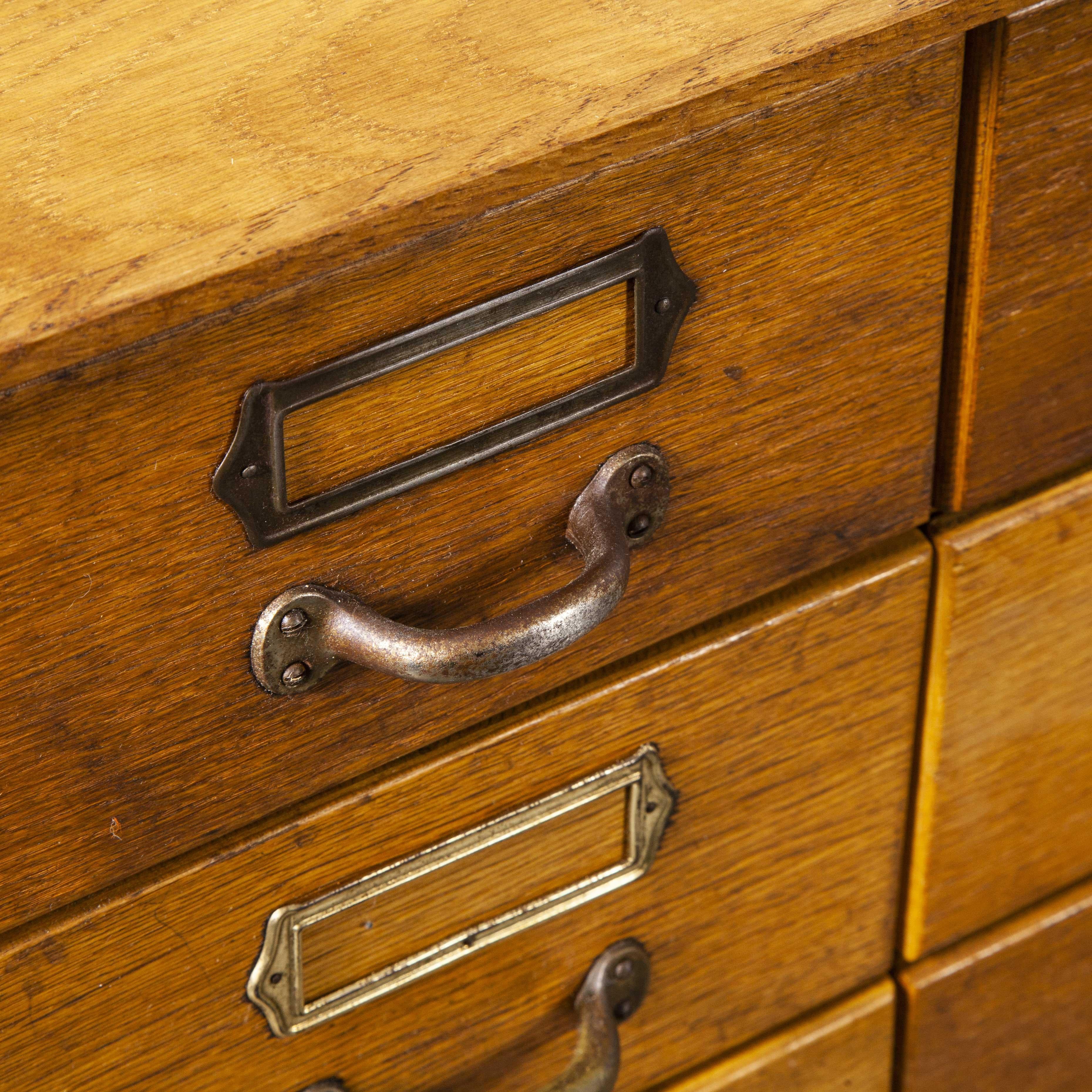1950s tall multi drawer chest of drawers – storage cabinet – forty eight drawers

1950s tall multi drawer chest of drawers – storage cabinet. With forty eight drawers this is a stunning practical chest. Sourced from a German bank this was