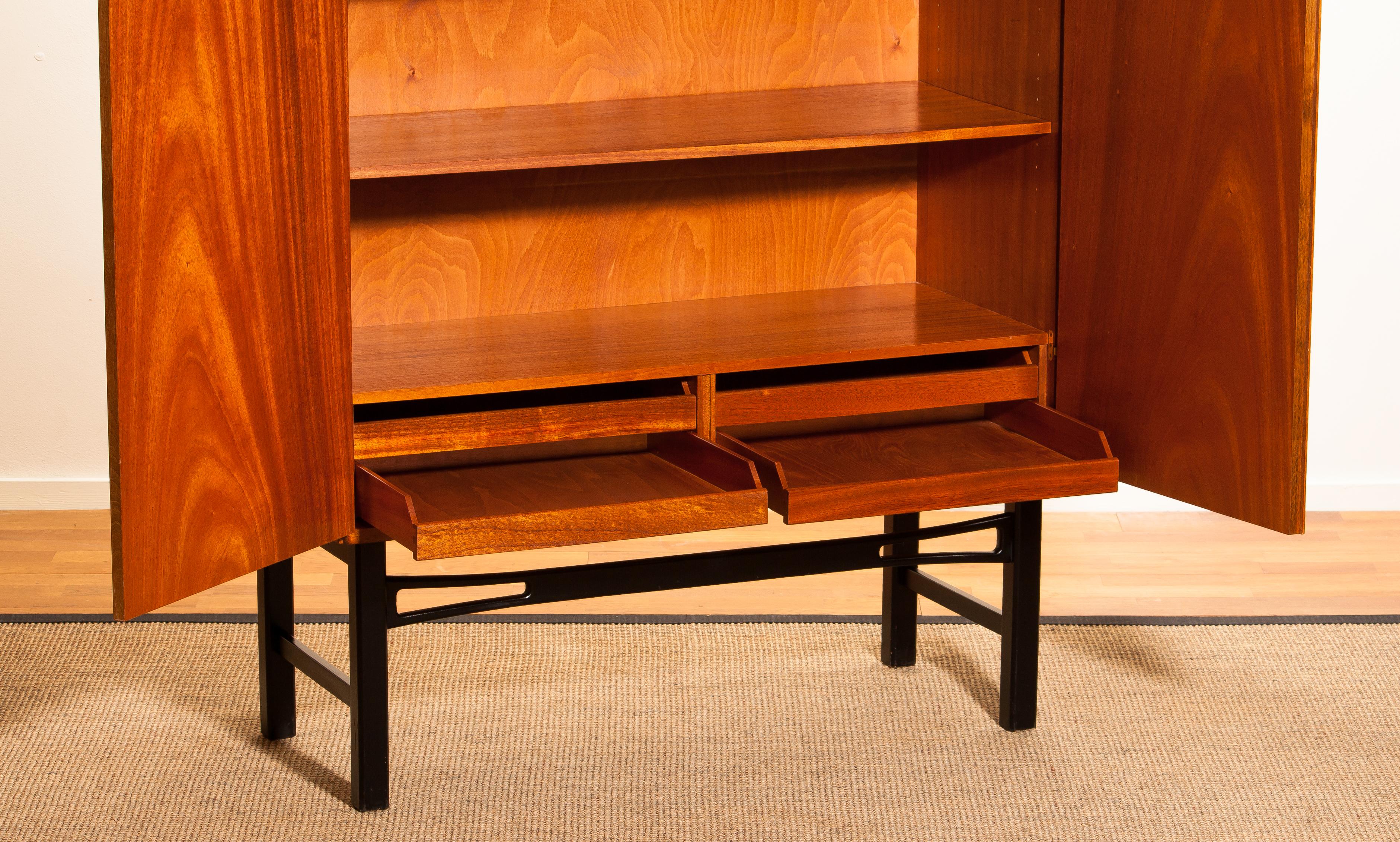 1950s, Teak High Board Buffet Cabinet on Black Stand , Sweden In Excellent Condition In Silvolde, Gelderland