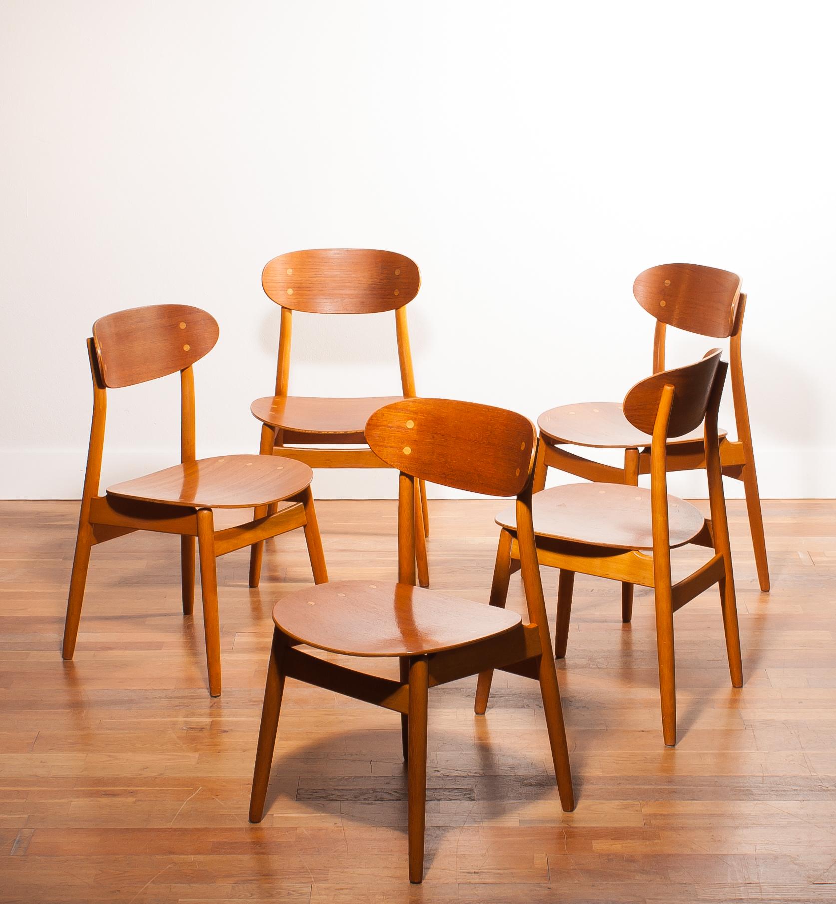 A very nice set of five dining chairs, model Eva, designed by Sven Erik Frylund for Hogafors Stolfabrik, Nässjö Denmark (marked)
The chairs are made of a teak seating and backrest on a beech frame.
They are in beautiful condition.
Period