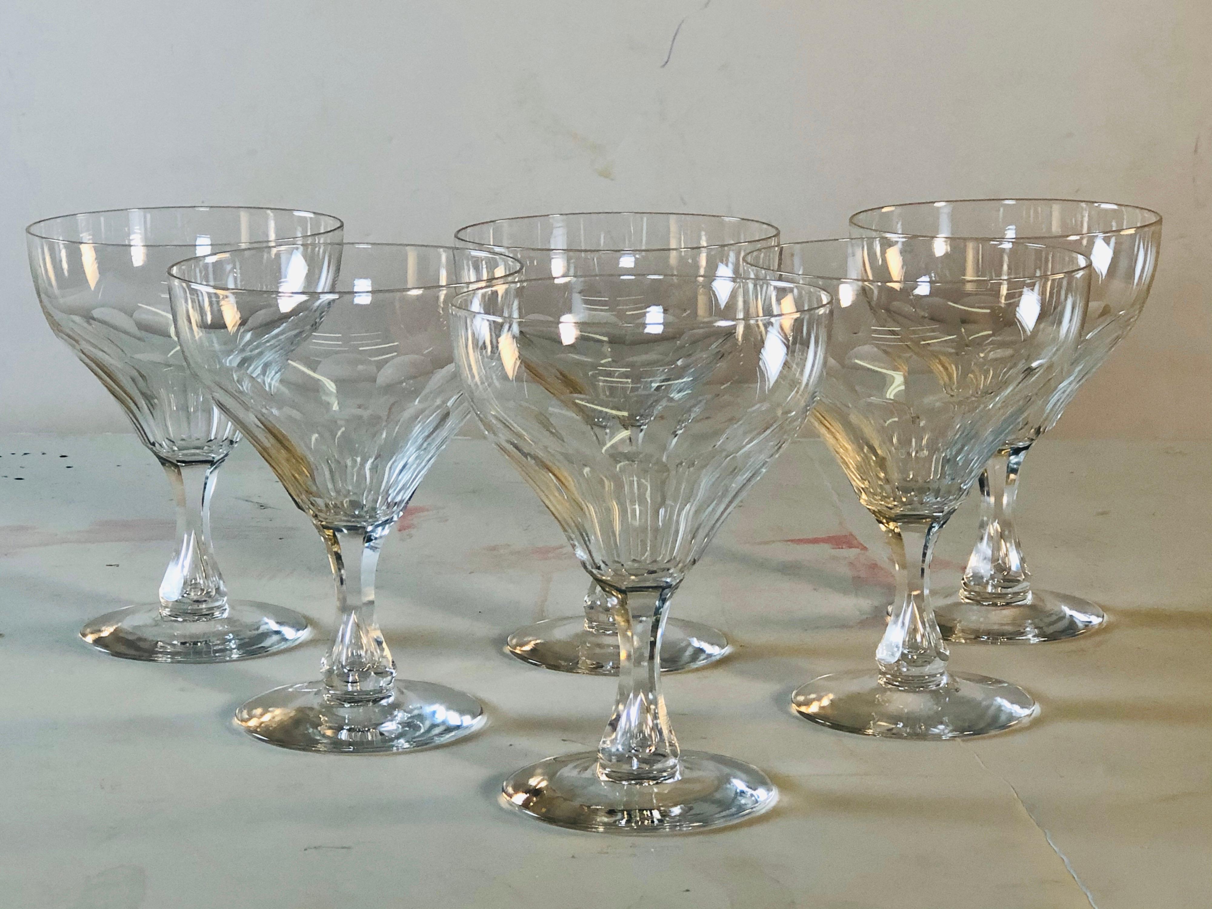 Vintage 1950s hand blown teardrop stem and mitred bowl coupes. Delicate and elegant coupe stems. No marks. Excellent condition.
