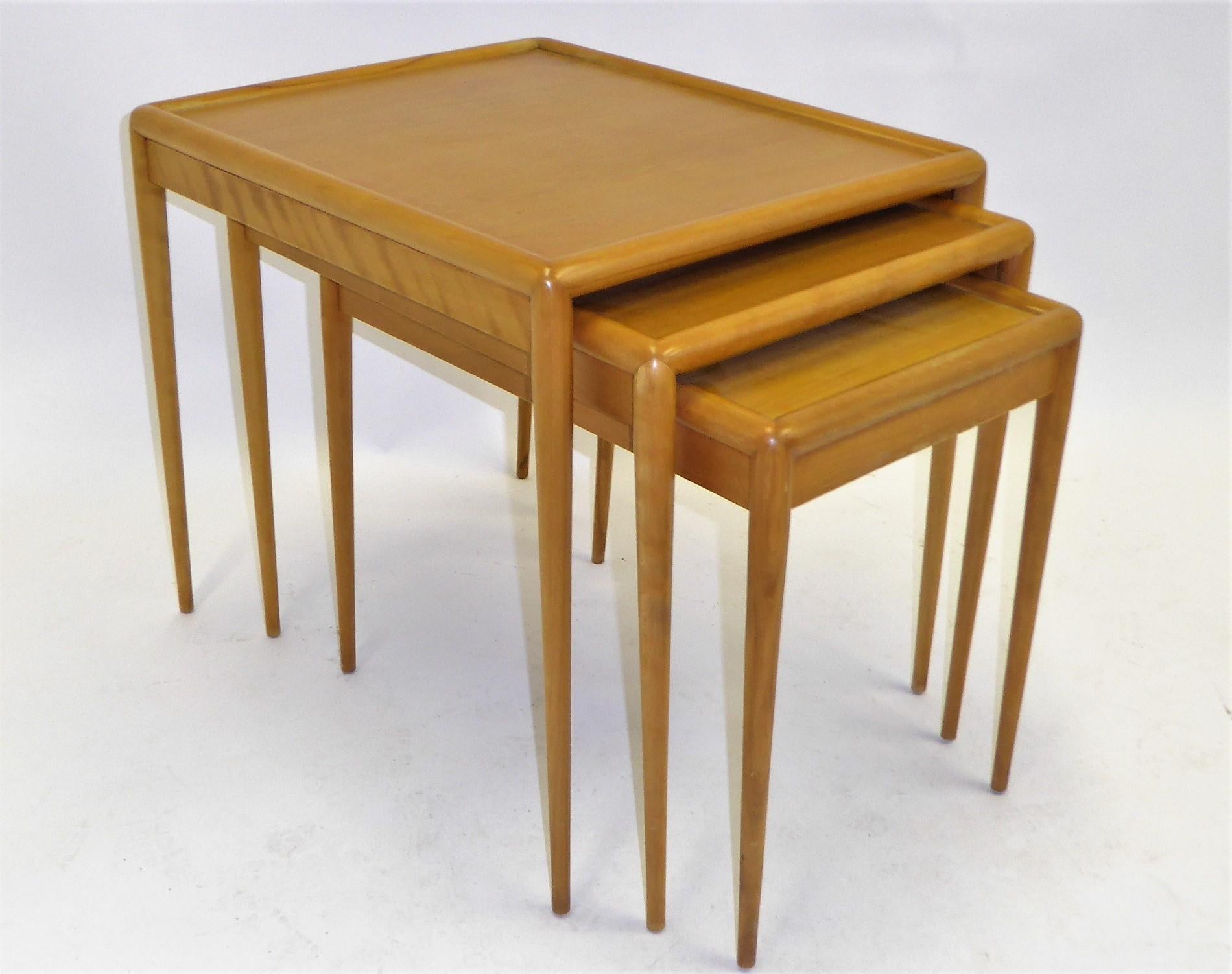 REDUCED FROM $3,250....Mid Century Modern super set of three matching nesting / stacking tables by T.H. Robsjohn-Gibbings for Widdicomb model no. 1783. In very good condition. Slight wear, see pics. Beautiful blond figured walnut in sorrel finish,