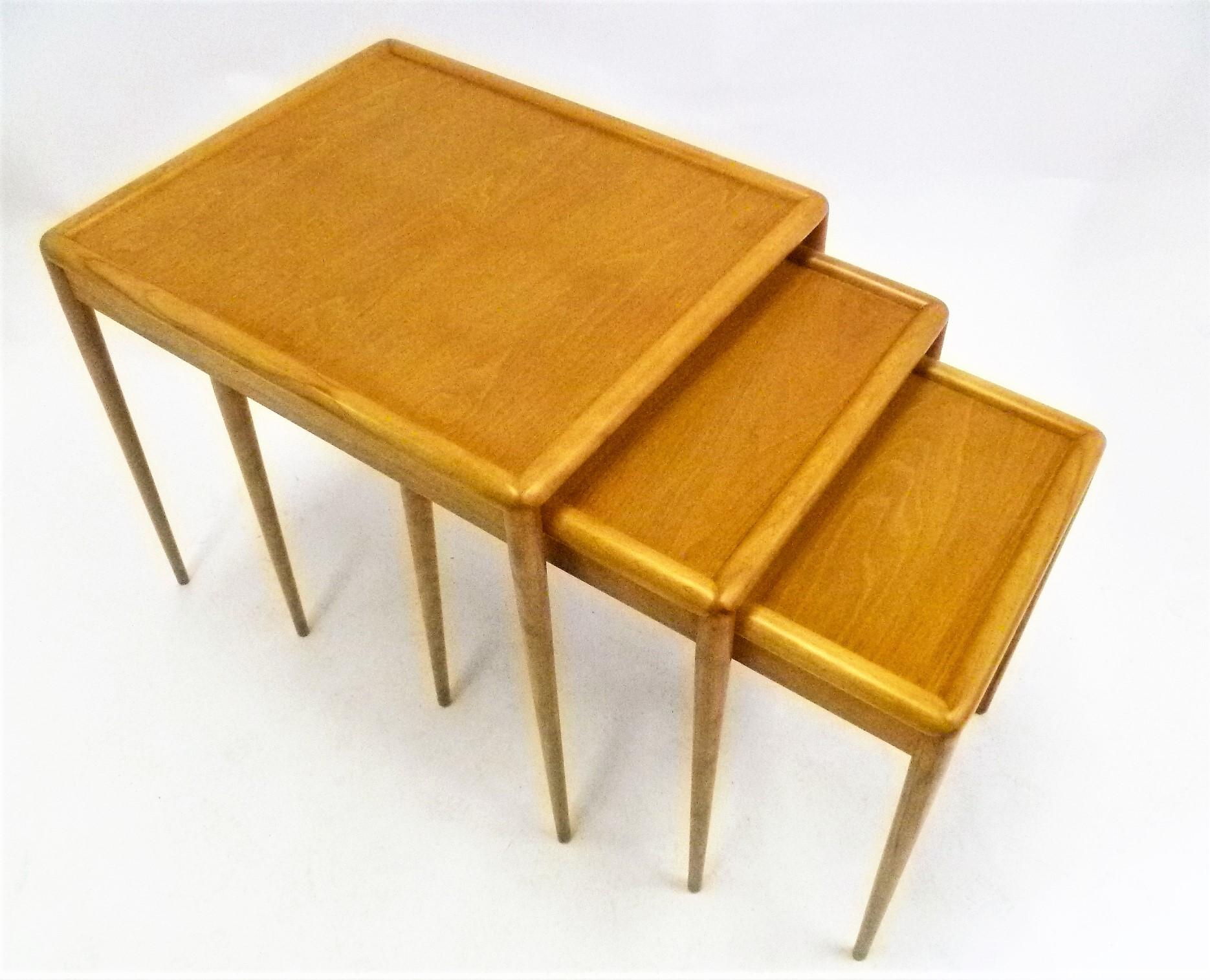REDUCED FROM $3,250...Super set of three matching Mid Century Modern nesting / stacking tables by T.H. Robsjohn-Gibbings for Widdicomb model no. 1783. In very, very good condition. Beautiful blond figured walnut in sorrel finish, retains signature