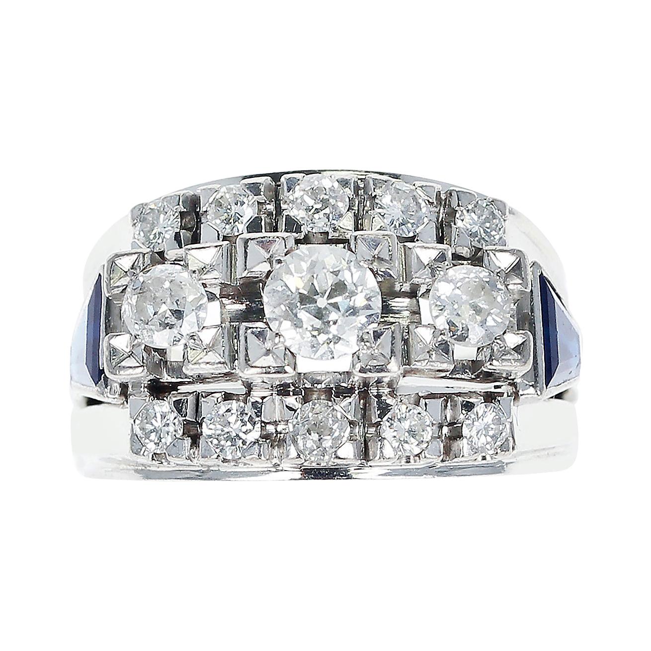 1950s Thirteen Round Diamond Bridal Ring Accented with Two Sapphire Trapezoids