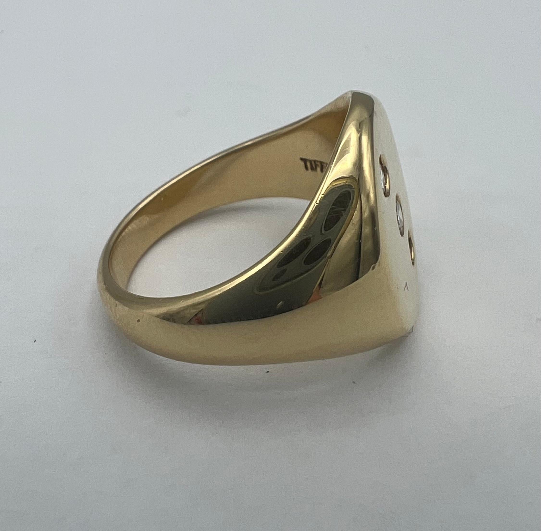 DESIGNER: Tiffany & Co.
CIRCA: 1950’s
MATERIALS: 14k Yellow Gold
GEMSTONE: 0.18 cts. Old Mine Cut Diamond, I-J/ VS2
WEIGHT: 10.4 grams
MEASUREMENTS: 5/8” x 1/2”
RING SIZE: 8
HALLMARKS: Tiffany & Co. 585
ITEM DETAILS:
A unisex ring by Tiffany & Co.,
