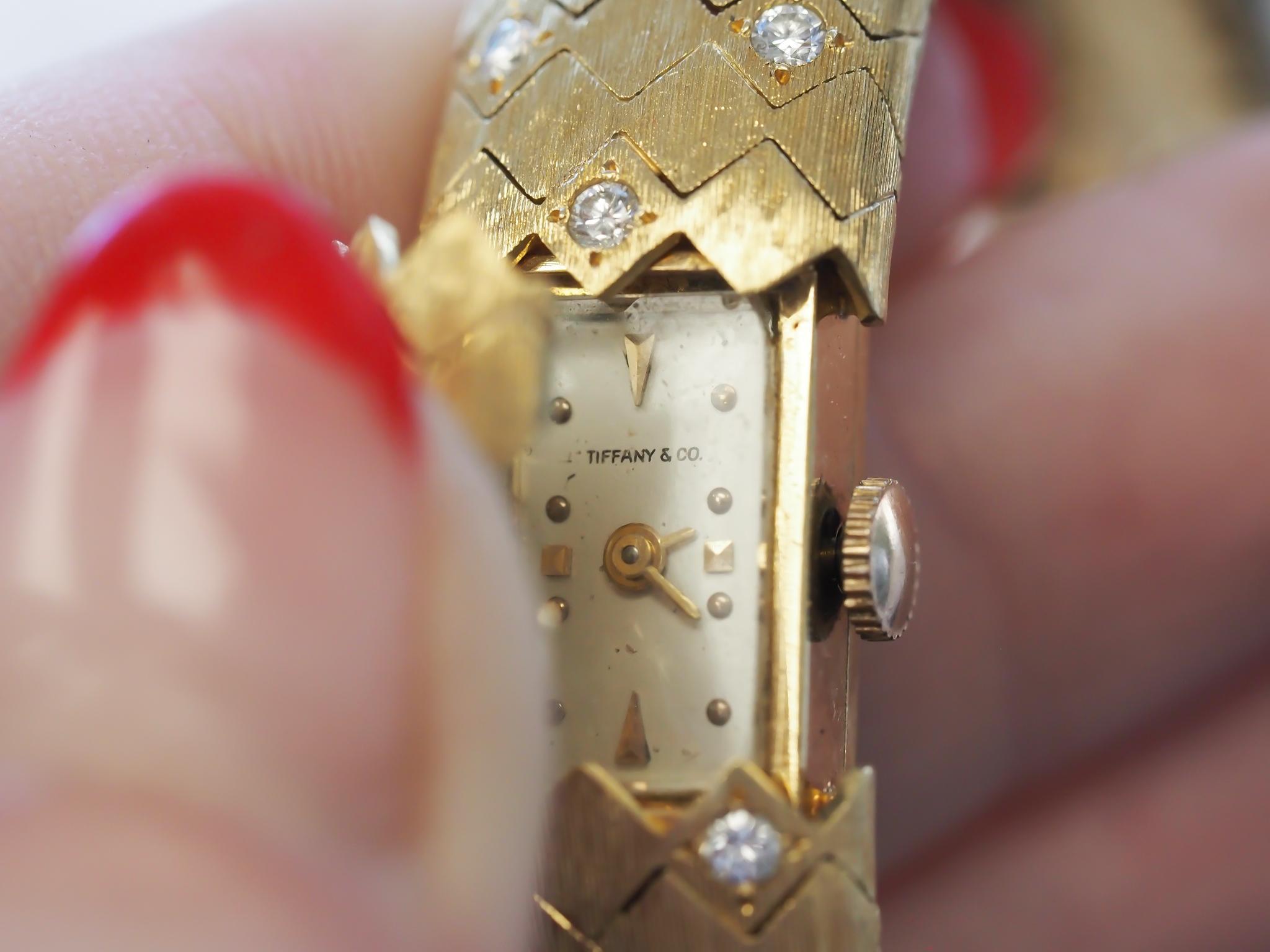 1950s Tiffany & Co. 18K Gold and Diamond  “Peek A Boo” Hidden Watch Bracelet For Sale 9