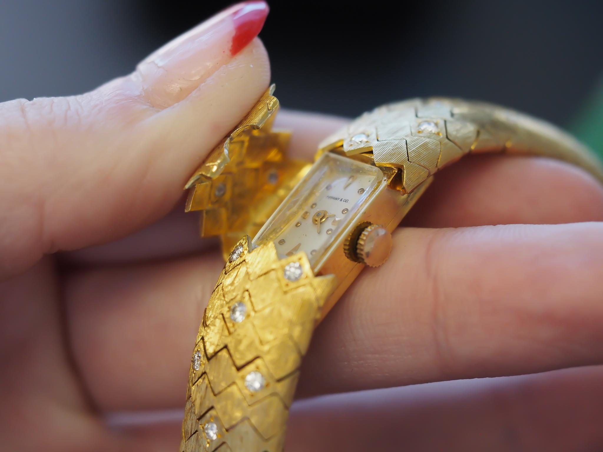 1950s Tiffany & Co. 18K Gold and Diamond  “Peek A Boo” Hidden Watch Bracelet For Sale 3