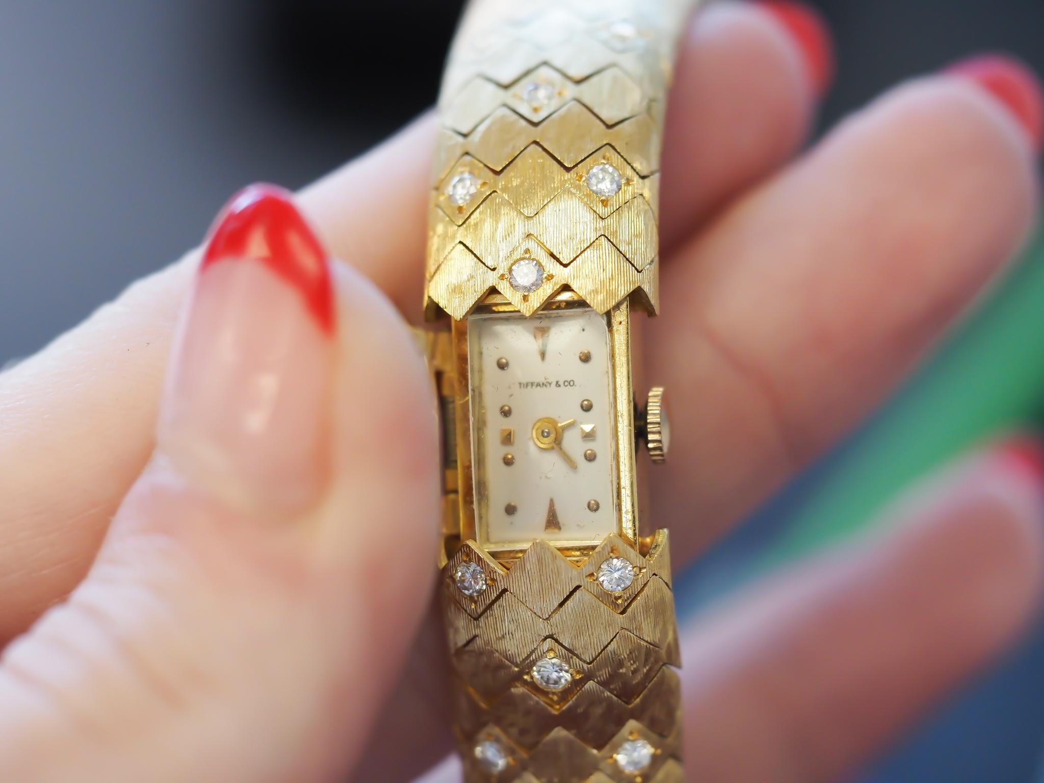 1950s Tiffany & Co. 18K Gold and Diamond  “Peek A Boo” Hidden Watch Bracelet For Sale 4