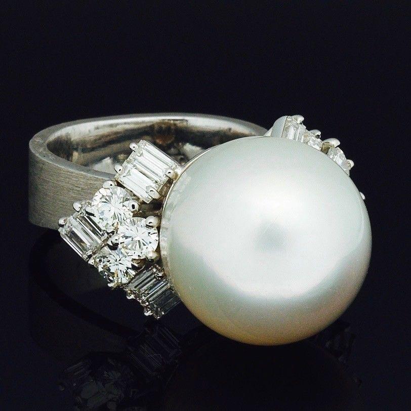 Stunning 1950s Mid Century 14k Tiffany & Co. 15.5mm South Sea Pearl 1.80 carat VVS Diamond Ring.

The ring measures a size 5-5.5 or so but can definitely be resized.

This ring is an absolute stunner! The Tiffany E/F VVS diamonds will impress in