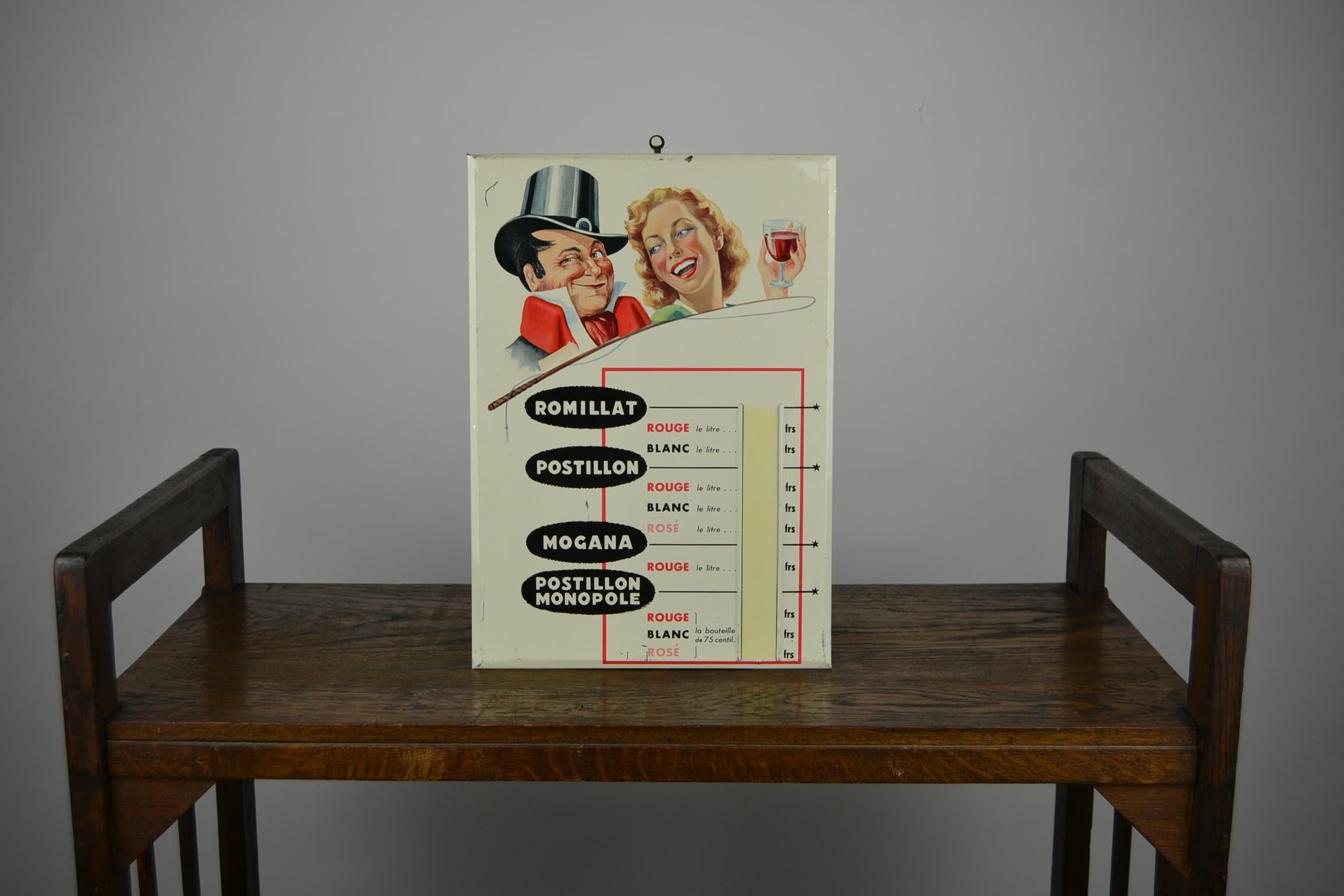 Original vintage lithographic tin sign - publicity sign - advertising sign - counter display - price display 
for Wine : Vin Du Postillon. 
Great design with a winking gentleman with top hat and a pretty lady holding up her glass of wine.
This
