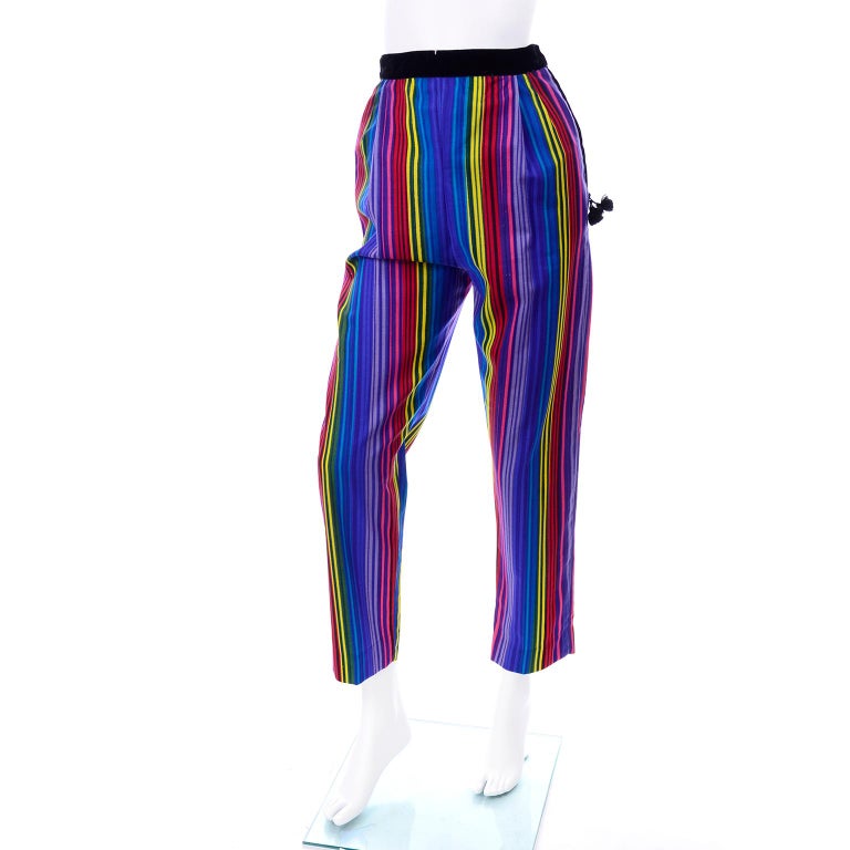 Rare mid century vintage deadstock vintage pants from designer Tina Leser with their original tags! This pair of vintage pants are a wonderful example of Leser's use of color and design.  They have a gorgeous striped fabric with vertical stripes in