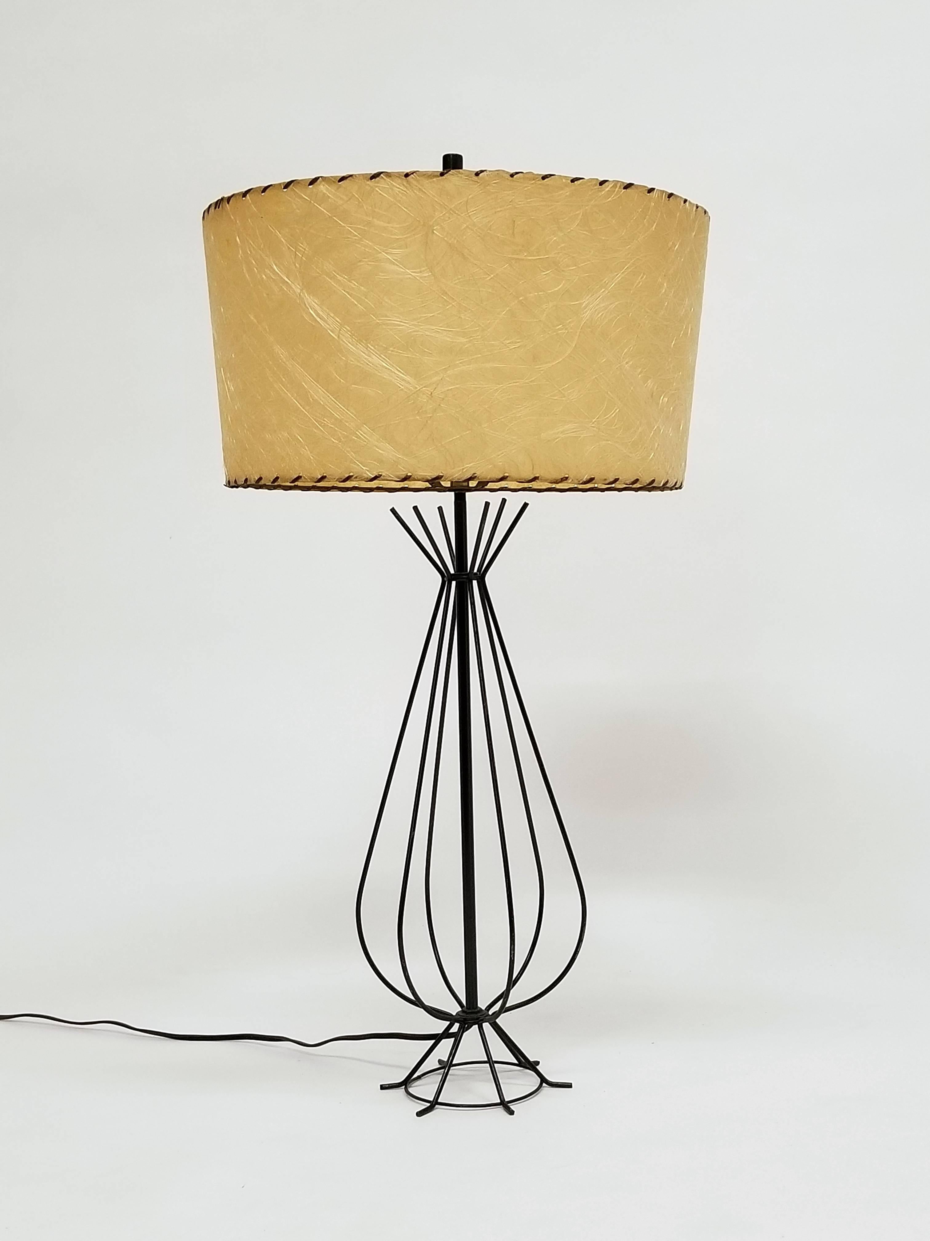 Enameled wire table lamp with fiberglass shade (come with order).

Lamp measure 21 in high by 21 in wide, 29 in with shade on.

Shade measure 15.25 in wide by 8 in high. 

Regular E26 size socket rated at 60 watt max.

Original wiring.