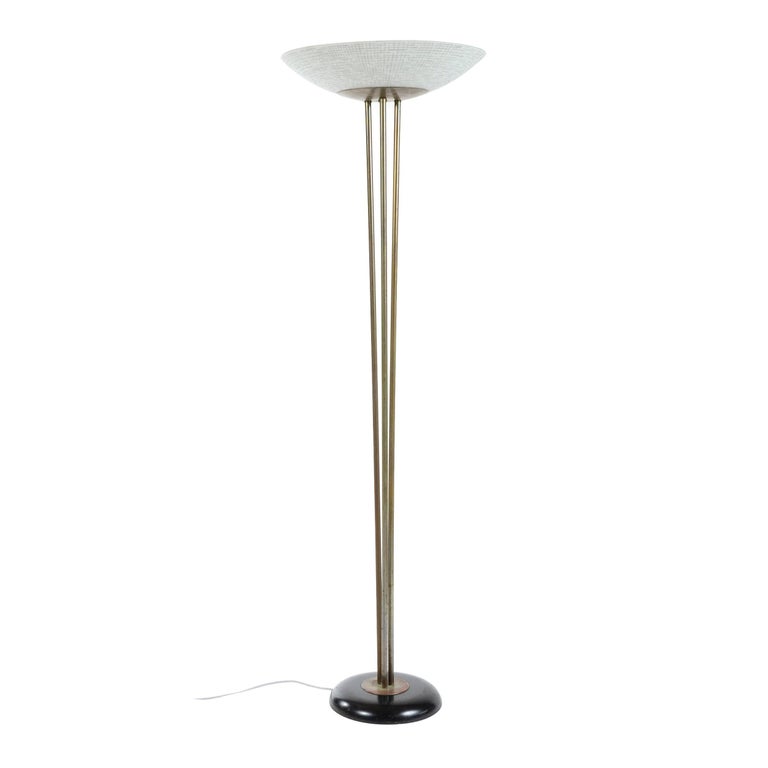 Classic uplight torchère floor lamp with three vertical brass rods supporting a shallow brass bowl and wider glass shade. The base designed by Gerald Thurston with a textured, fire annealed enameled glass shade designed by Carl Moser from his