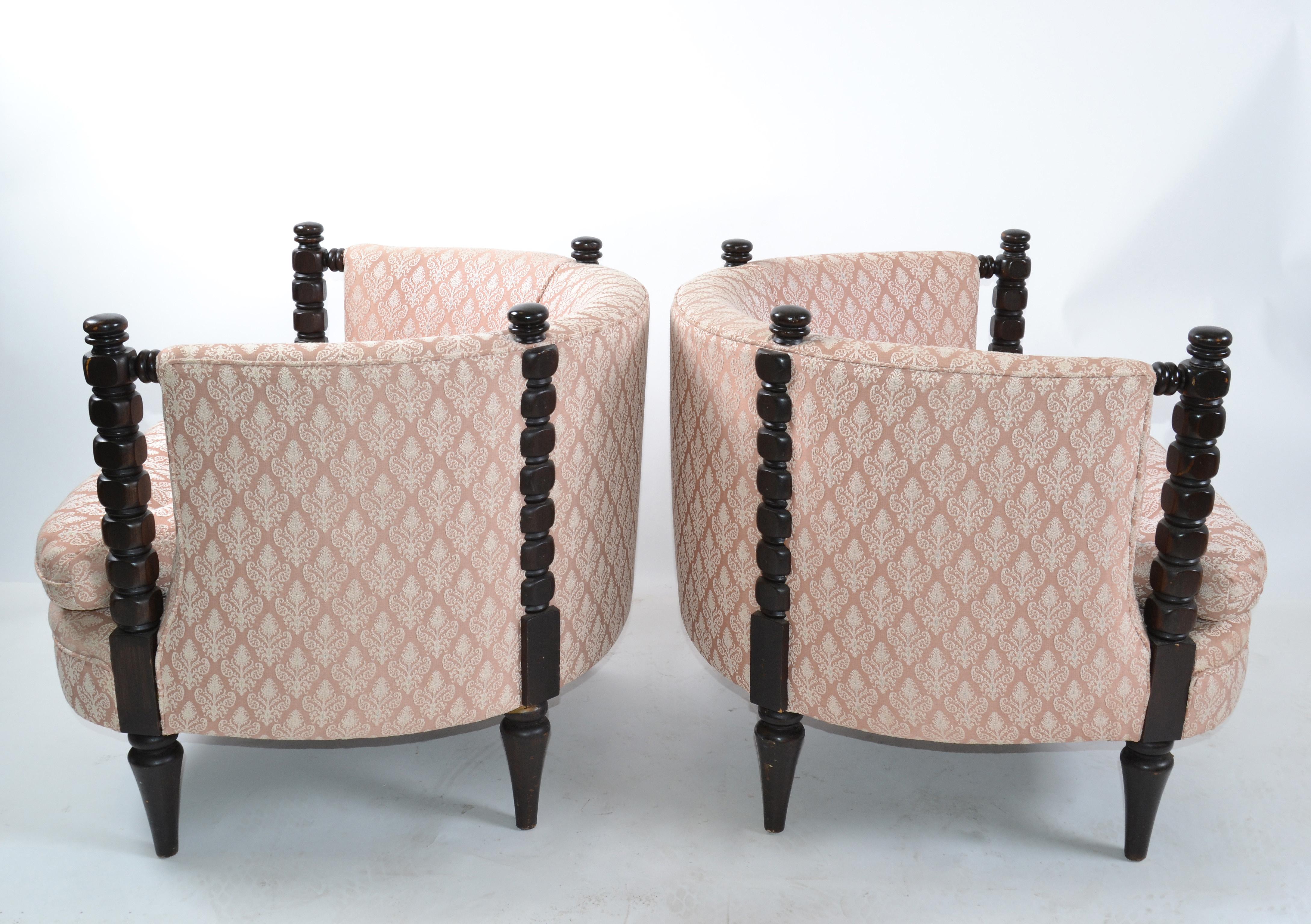 Two neoclassical club or barrel chairs from the 1950s made in America.
Turned wooden legs, arm details and in a pale pink tufted upholstery.
Great chairs for your favorite reading room.