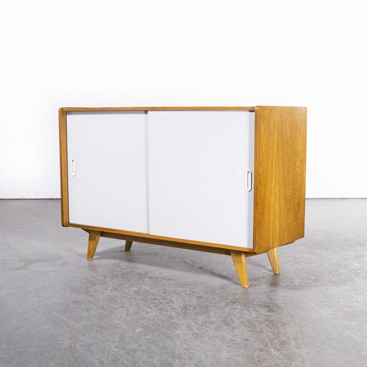 Model U-452 – 1950’s two door cabinet by Jiri Jiroutek for Interieur Praha
Model U-452 – 1950’s two door cabinet by Jiri Jiroutek for Interieur Praha. These cabinets by Praha are increasingly popular due to their practical size and this piece is a